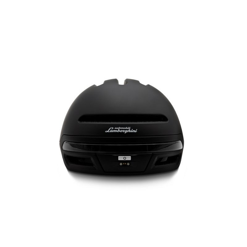 Czarny kask rowerowy Lamborghini. Ma logo i znajduje się na białym tle. Kask ma światła i otwory wentylacyjne.