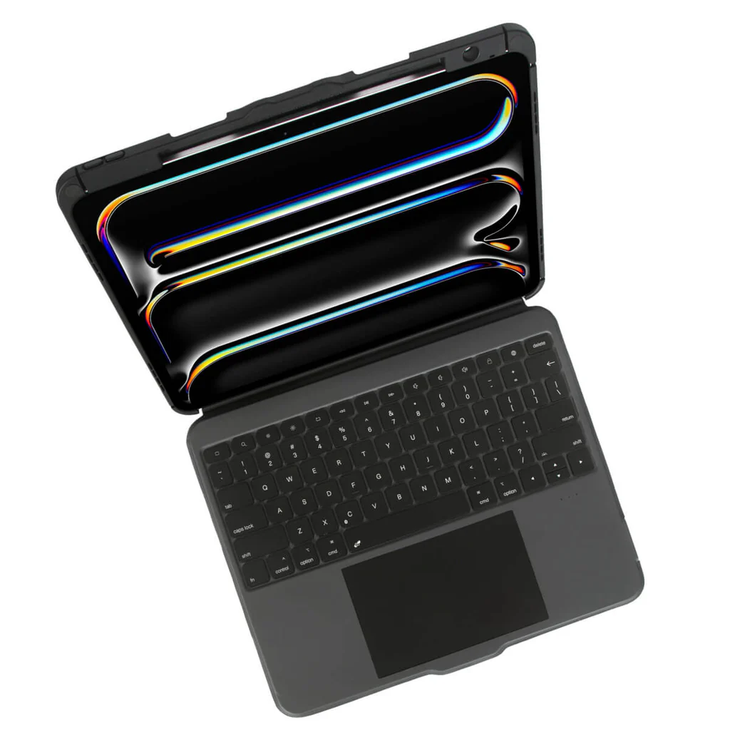 Una tableta abierta con un teclado adjunto. La pantalla es negra con reflejos coloridos. El teclado es gris con un panel táctil.