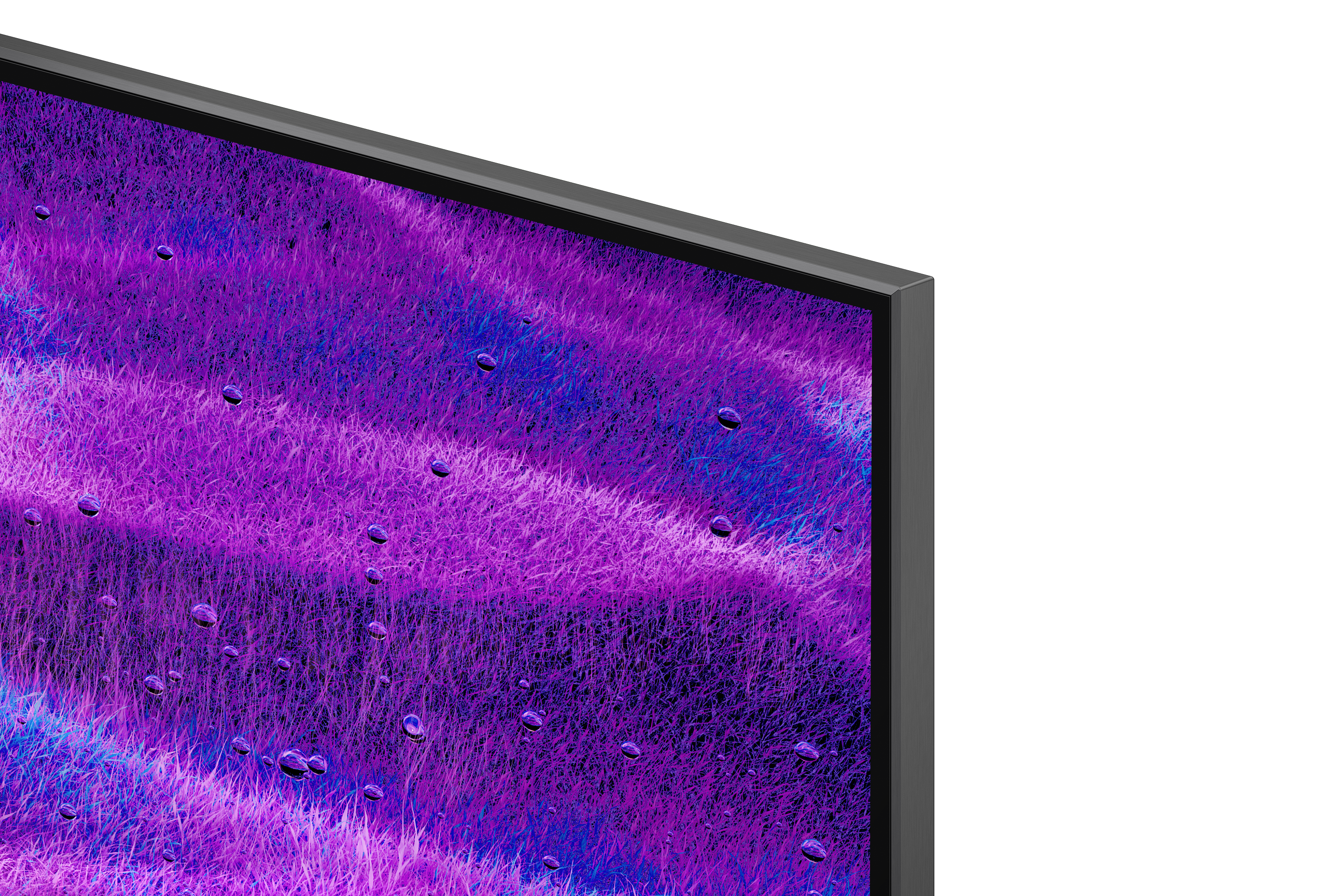Nahaufnahme eines Fernsehbildschirms. Anzeige zeigt lilafarbenes und blaues abstraktes Gras, mit Wassertropfen. Schwarzer Rahmen und Hintergrund.