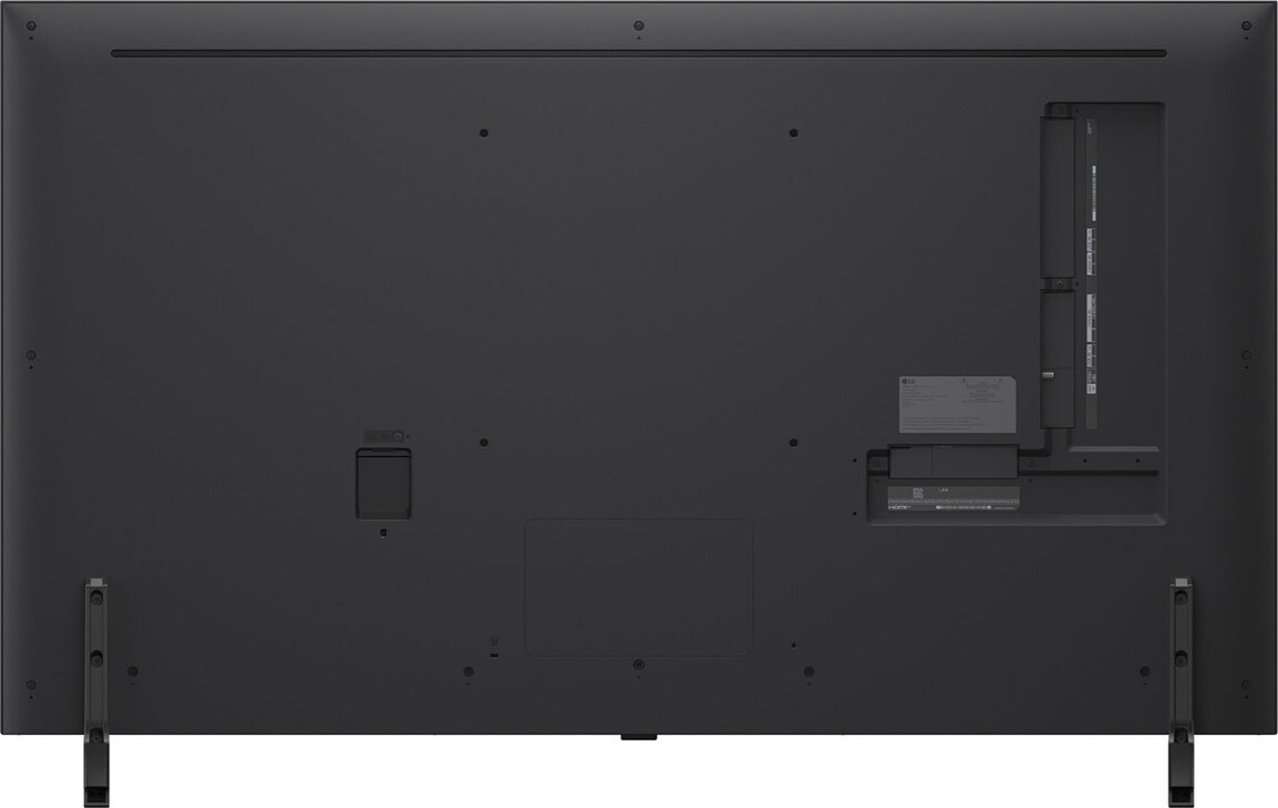 Retro di una TV LG nera, con porte, etichette e supporti. Include ingresso alimentazione, HDMI e LAN.