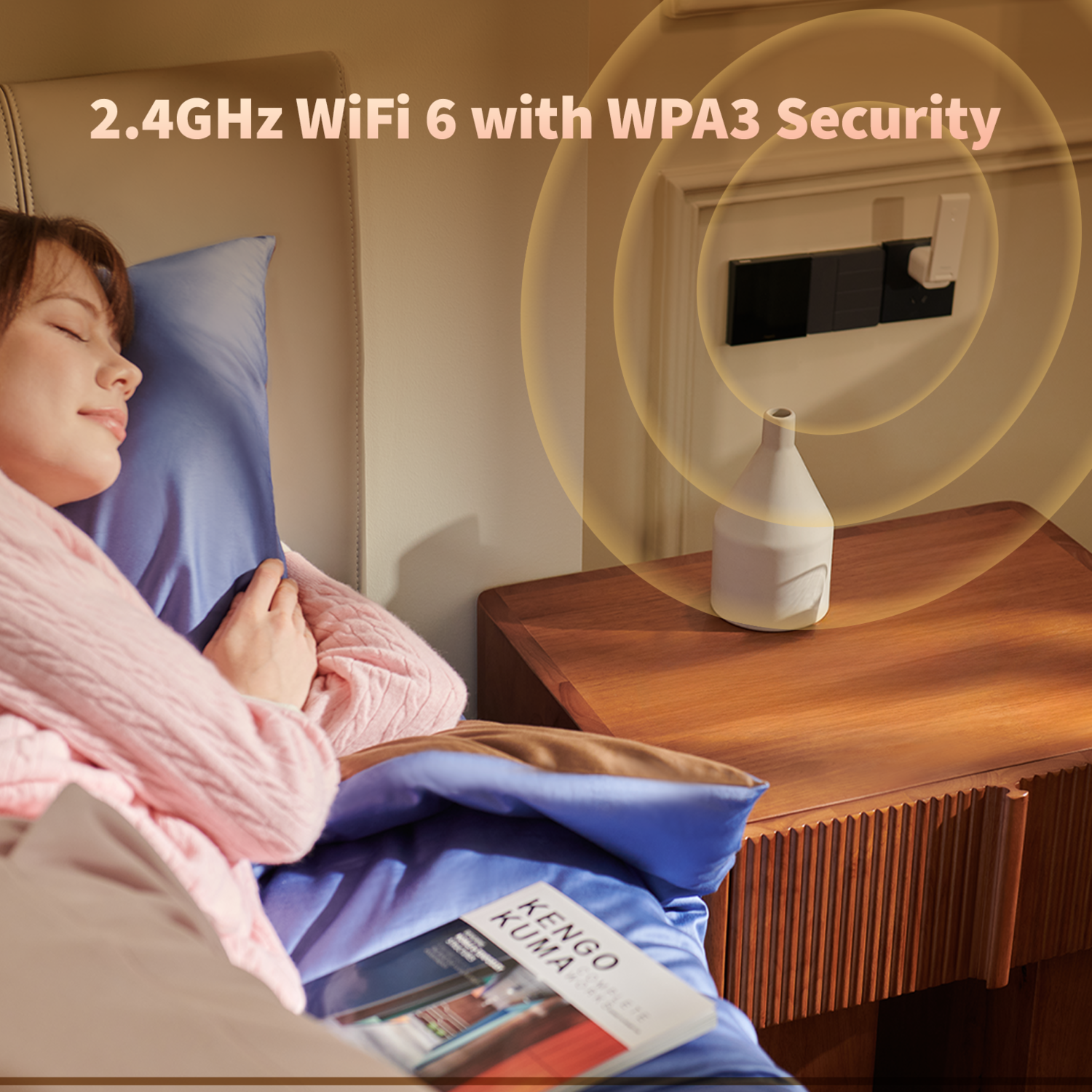 A woman sleeps in bed. A bedside table with a white vase and a book is next to her. WiFi router is on the wall.
