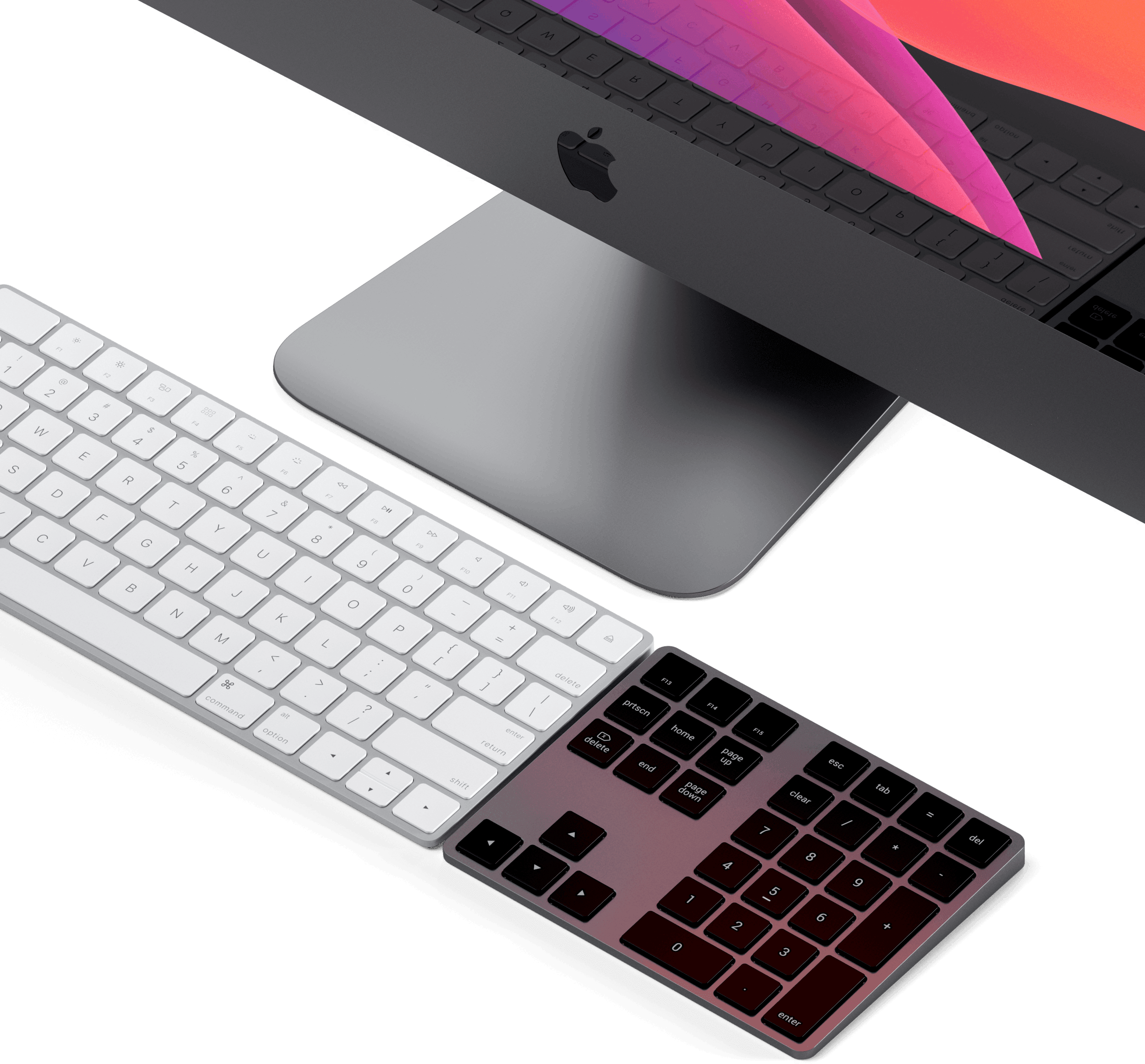 Fehér billentyűzet, fekete számbillentyűzet és képernyő zöld felületen. Apple logó látható.
