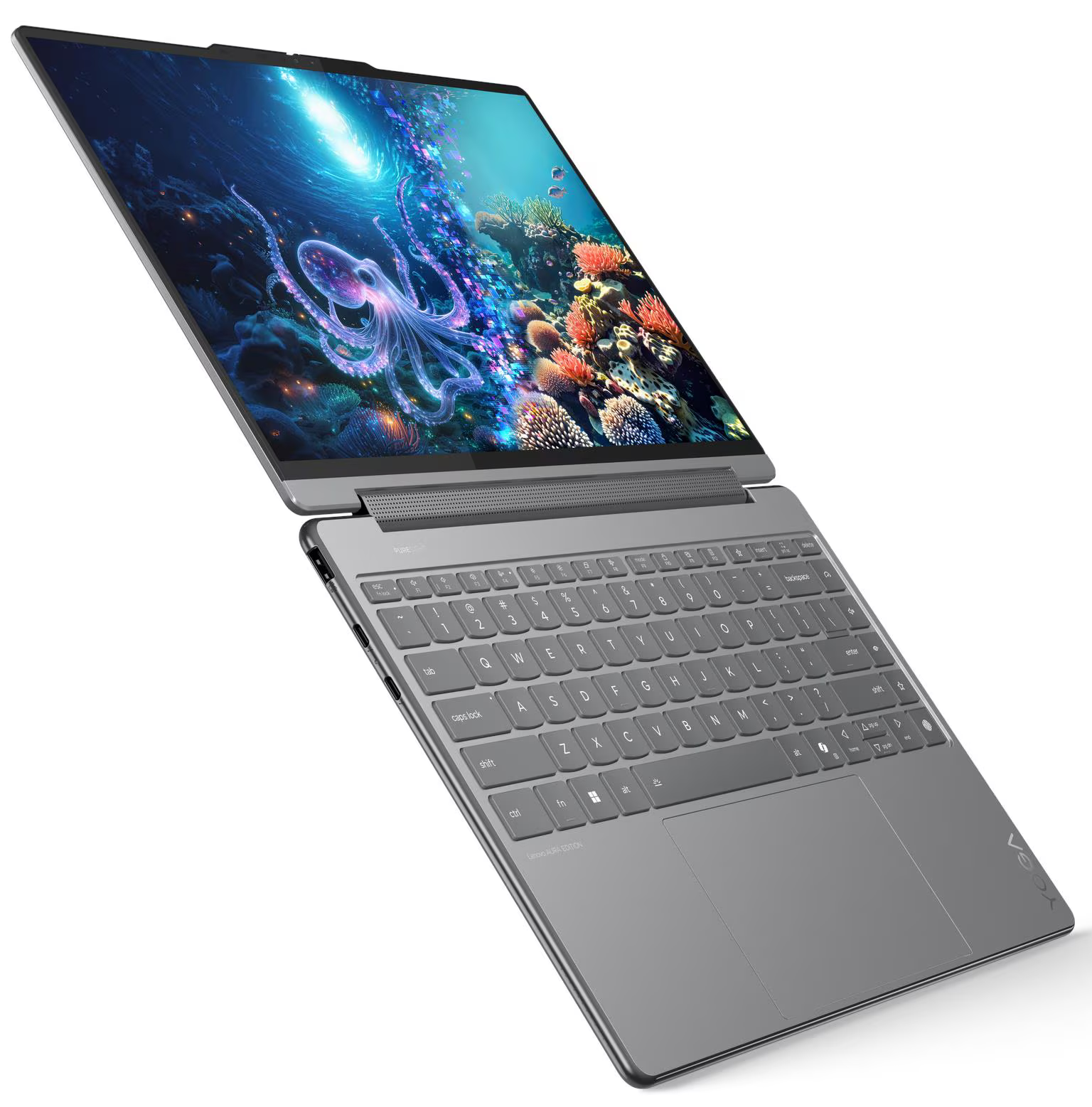 Laptop nyitott képernyővel, amely egy polipot mutat egy víz alatti jelenetben. A billentyűzet szürke.