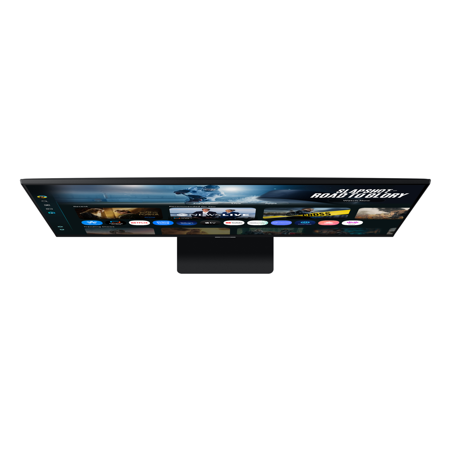 A monitor displays a streaming service interface. The screen shows various app icons and movie titles against a black background.