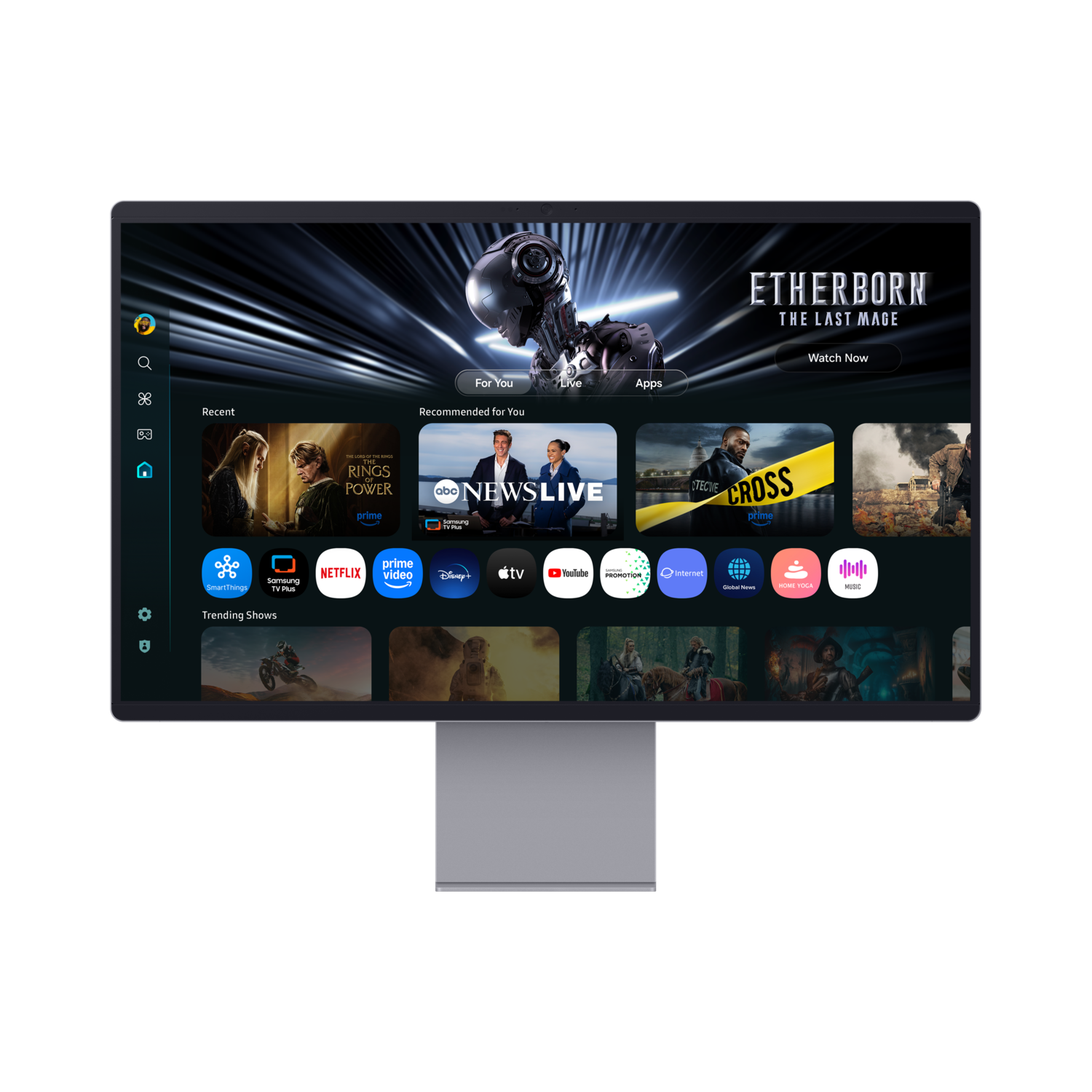 Een monitor geeft een streaming app interface weer. Shows zijn onder andere 'The Rings of Power', 'News Live' en 'Detective Cross'.