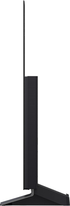 Seitenansicht eines schwarzen Flachbildfernsehers auf einem Ständer. Der Fernseher ist rechteckig, mit einem dünnen Rahmen.