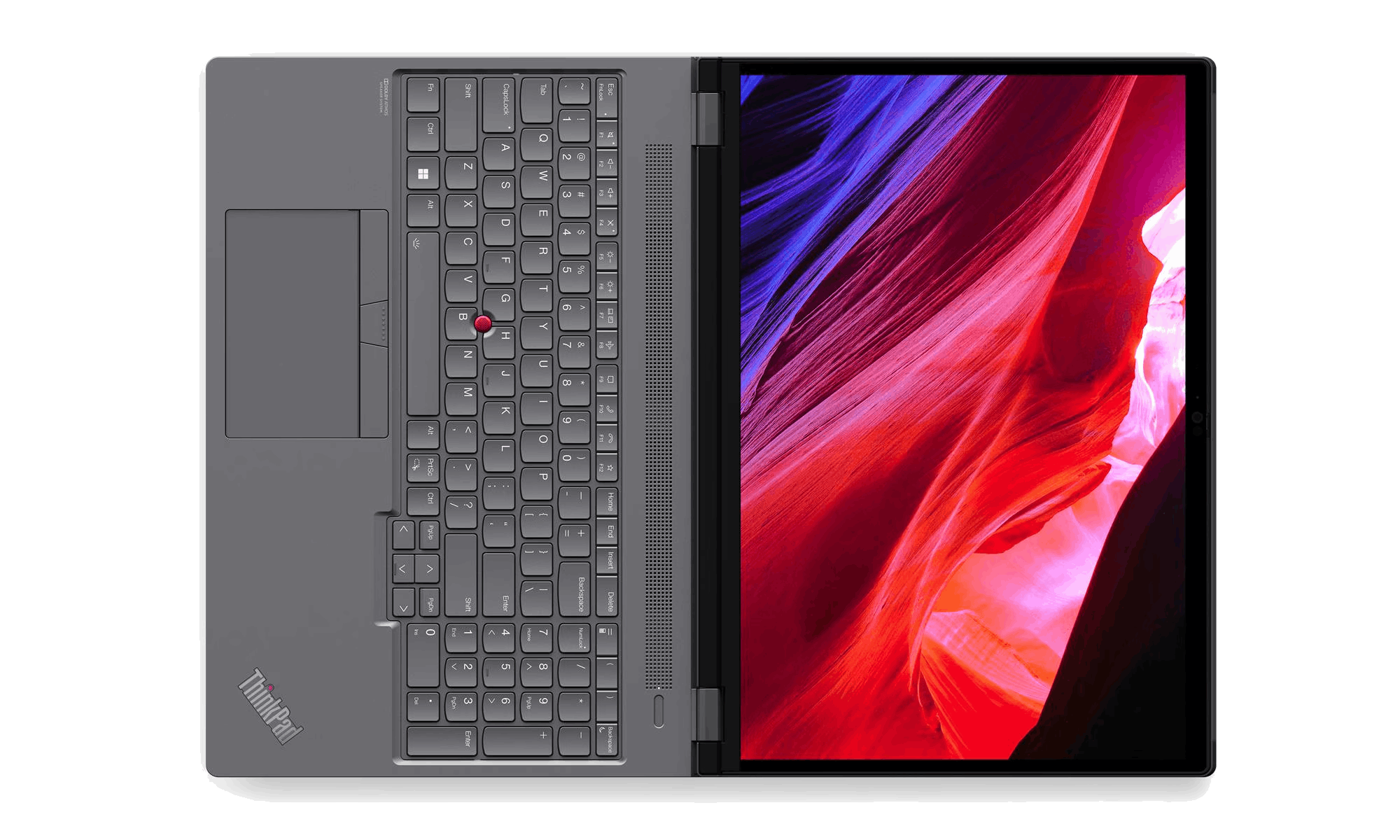 Portátil abierto, mostrando teclado y pantalla. La pantalla muestra imagen abstracta roja, naranja y morada. El teclado es gris.