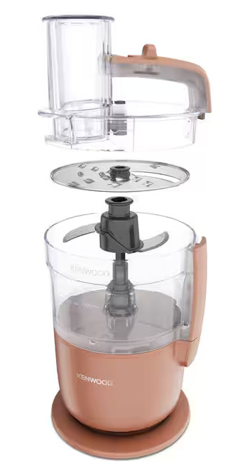 Widok rozłożony robota kuchennego w kolorze różowego złota. Części obejmują podstawę silnika, misę, ostrza i pokrywę z rurą podającą.