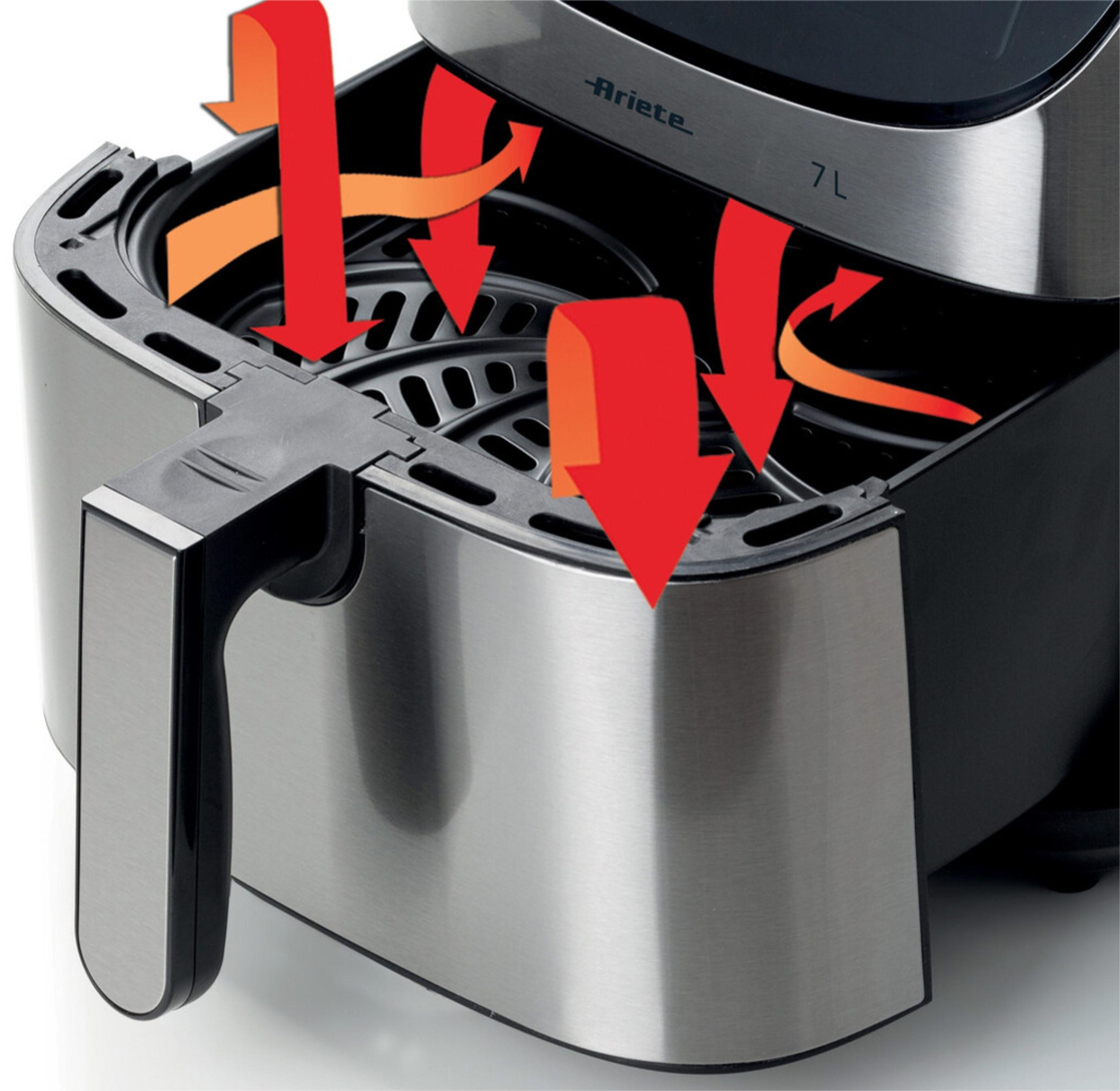Frytkownica powietrzna z czerwonymi i pomarańczowymi strzałkami wskazującymi cyrkulację powietrza. Frytkownica jest srebrna i czarna.