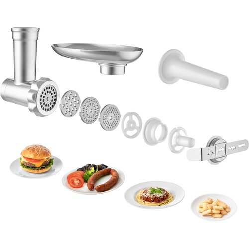 Widok rozstrzelony maszynki do mięsa, z częściami i płytami, obok talerzy z jedzeniem, w tym burgerem, makaronem i kiełbaskami.