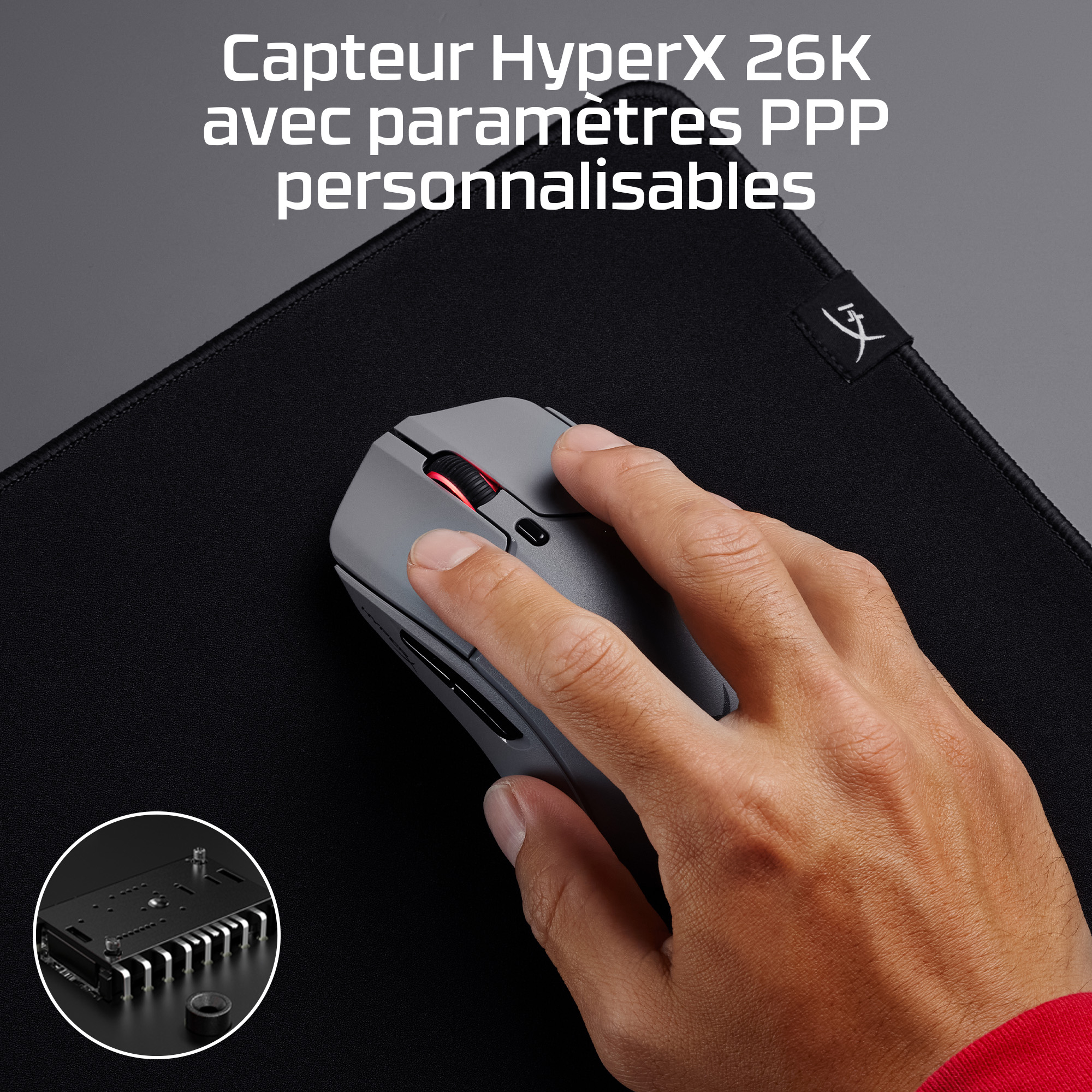 A hand using a gray mouse on a black mousepad. Text at the top says 'HyperX 26K sensor with customizable PPP settings'.
