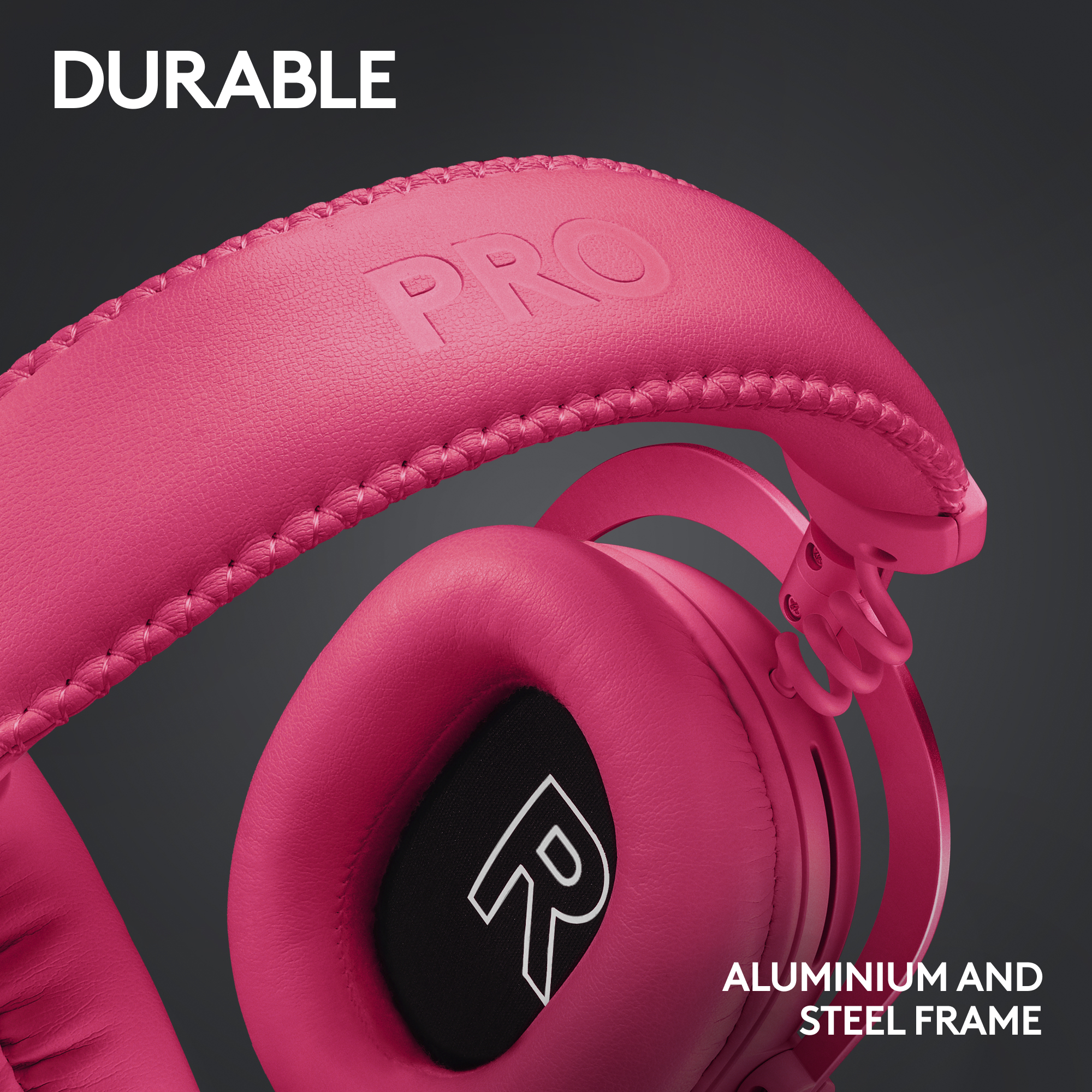 Cuffie rosa con fascia e padiglioni cuciti. Il testo dice 'Durable' e 'Aluminium and Steel Frame'.