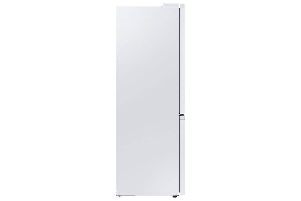 Un refrigerador blanco, visto de lado. Tiene forma rectangular, con manija y bisagras visibles.