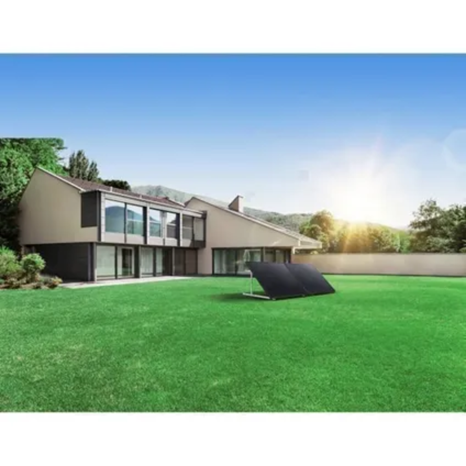 A modern house with a solar panel in the yard. Green grass, blue sky, and trees in the background. The sun is shining.