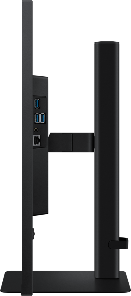 Vue latérale d'un écran d'ordinateur noir. Il possède des ports USB, Ethernet et audio. Le support est également noir.