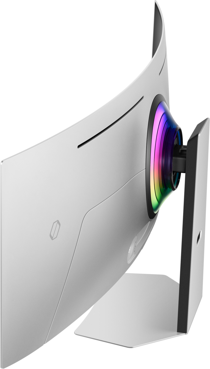 Un écran d'ordinateur blanc incurvé, légèrement incliné. L'arrière montre un anneau lumineux arc-en-ciel et un support. Fond noir.