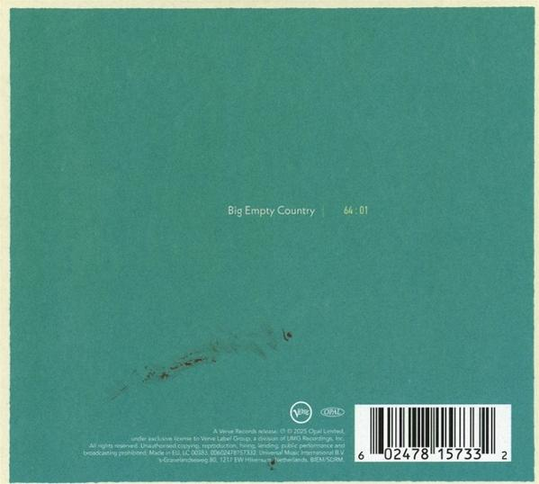Das CD-Cover zeigt einen türkisfarbenen Hintergrund mit dem Text "Big Empty Country" und "64:01". Unten rechts befindet sich ein Barcode.