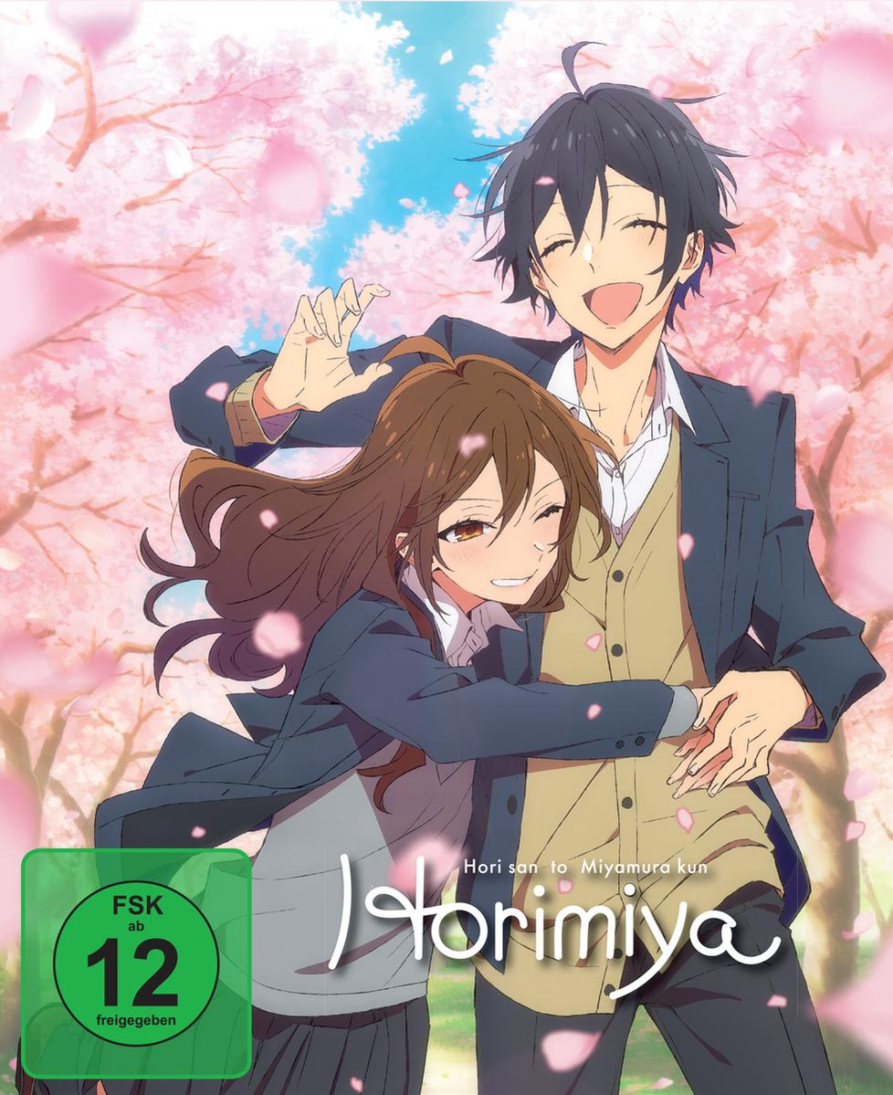 Anime-Cover. Ein Paar umarmt sich unter Kirschblüten. Links unten ein grüner Kreis mit "FSK ab 12".