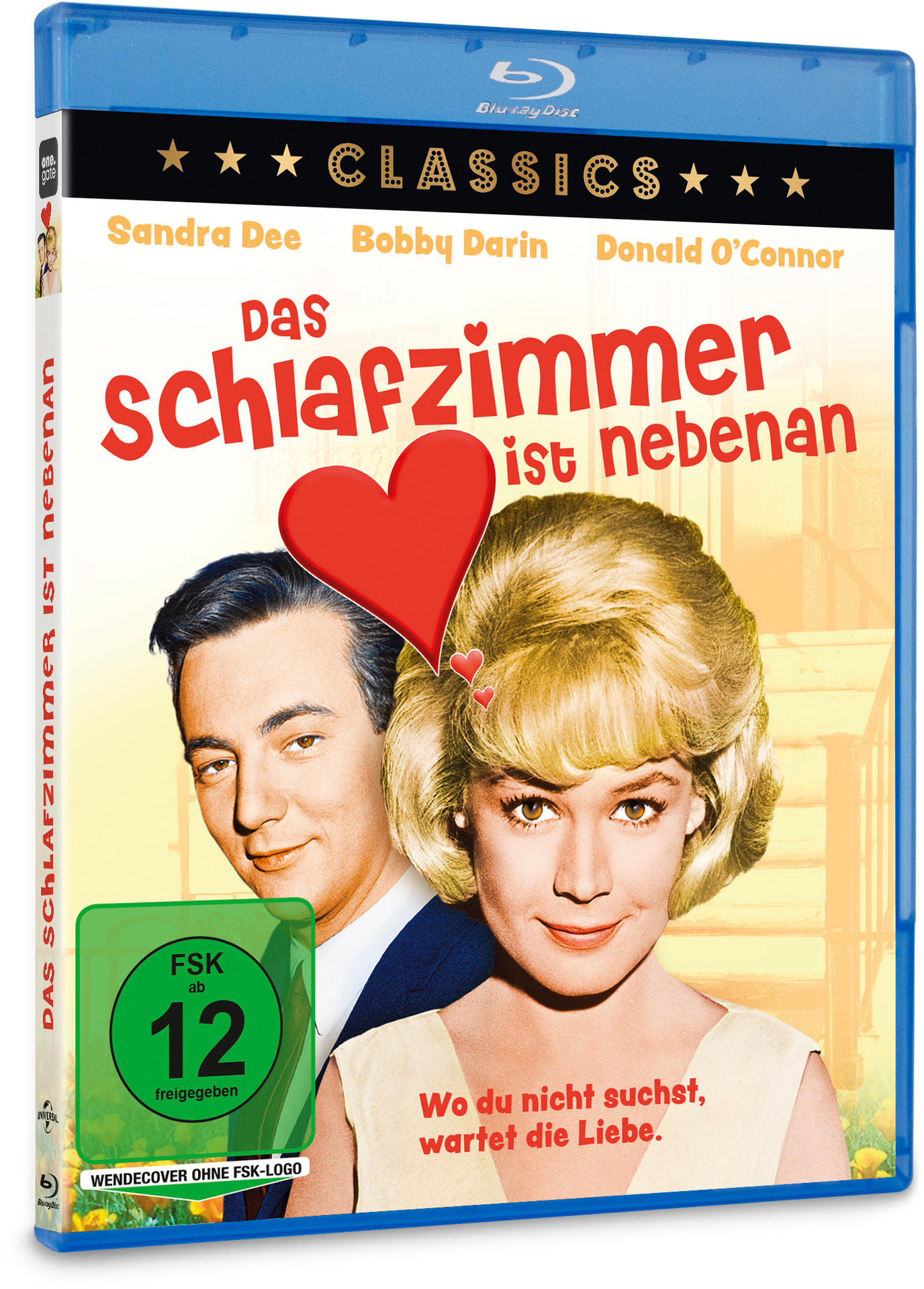 Blu-ray-Cover mit Paar, rotem Herz und deutschem Text 'Das Schlafzimmer ist nebenan'. Altersfreigabe: 12.