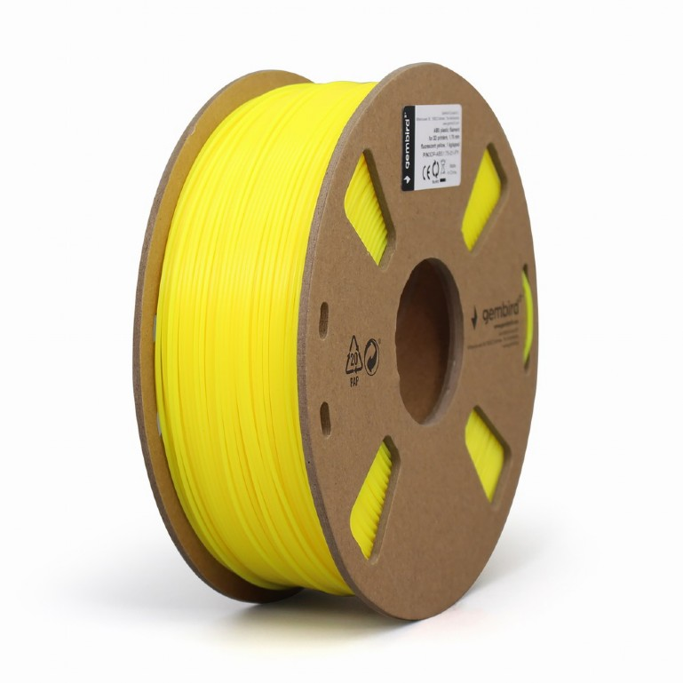 Egy élénksárga 3D nyomtató filamentum tekercs. A tekercs kartonból van, címkével. A filamentum fluoreszkáló sárga.