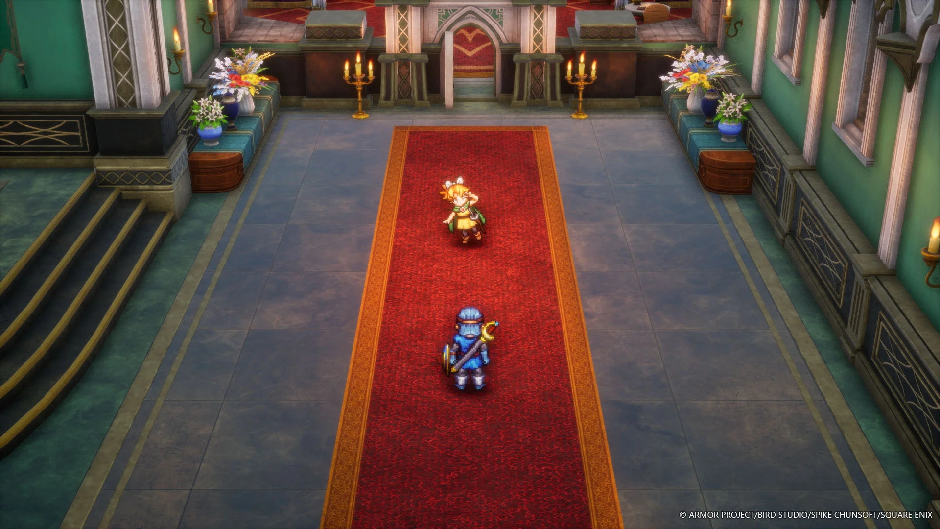 Un tapis rouge mène à une porte ornée. Deux personnages se tiennent dessus, l'un en armure bleue, l'autre en jaune. La pièce est grandiose.