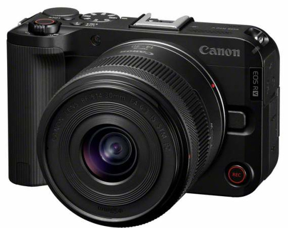 Czarny aparat bezlusterkowy Canon EOS R z obiektywem. Obiektyw jest widoczny, z marką Canon. Aparat ma przyciski i pokrętła.