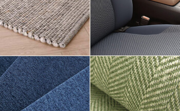 Cztery zbliżenia próbek tkanin: szary dywan, niebieskie siedzenie samochodowe, niebieska tkanina i zielony wzór w jodełkę.