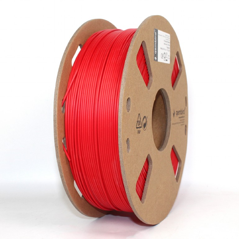 Egy piros 3D nyomtató filament tekercs fehér felületen. A tekercs kartonból készült, gembird logóval.