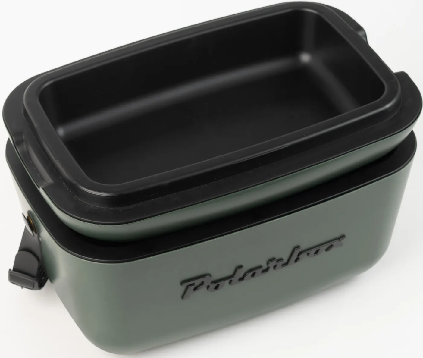 Un chauffe-plat vert avec un intérieur noir. Le plateau supérieur est à l'intérieur du bas. Le nom "Polarstar" est sur le devant.