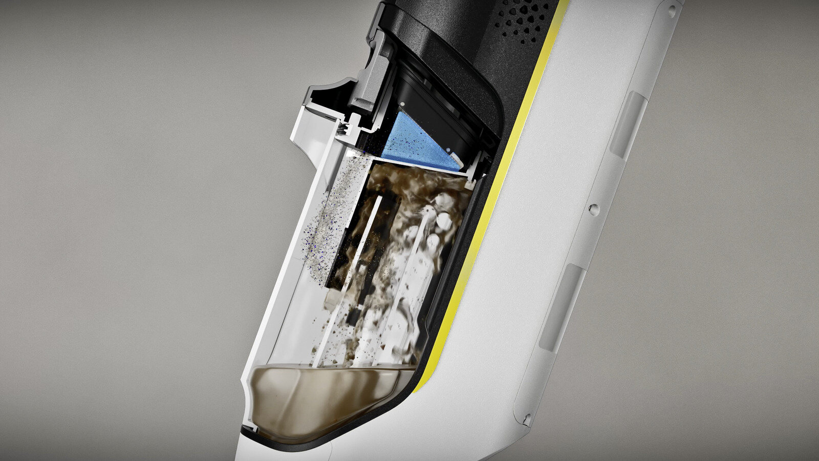 Widok przekrojowy odkurzacza pokazujący elementy wewnętrzne. Niebieski filtr i brudna woda są widoczne w przezroczystym zbiorniku.