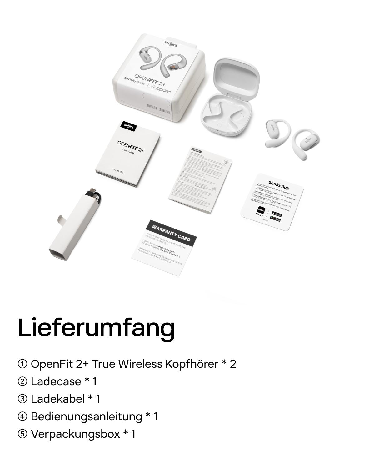 Weiße Shokz OpenFit 2+ Kopfhörer und Zubehör sind auf weißer Oberfläche angeordnet. Artikel umfassen eine Box, ein Etui und Handbücher.