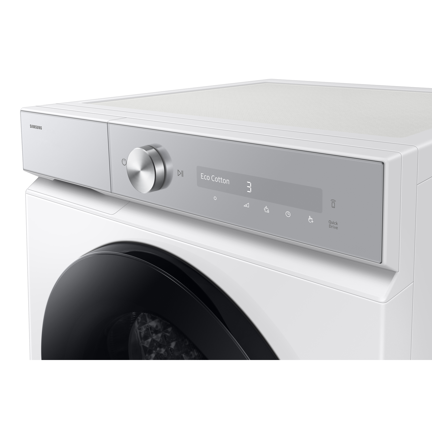 White washing machine with a control panel. It has a silver knob, a digital display, and buttons for various settings.