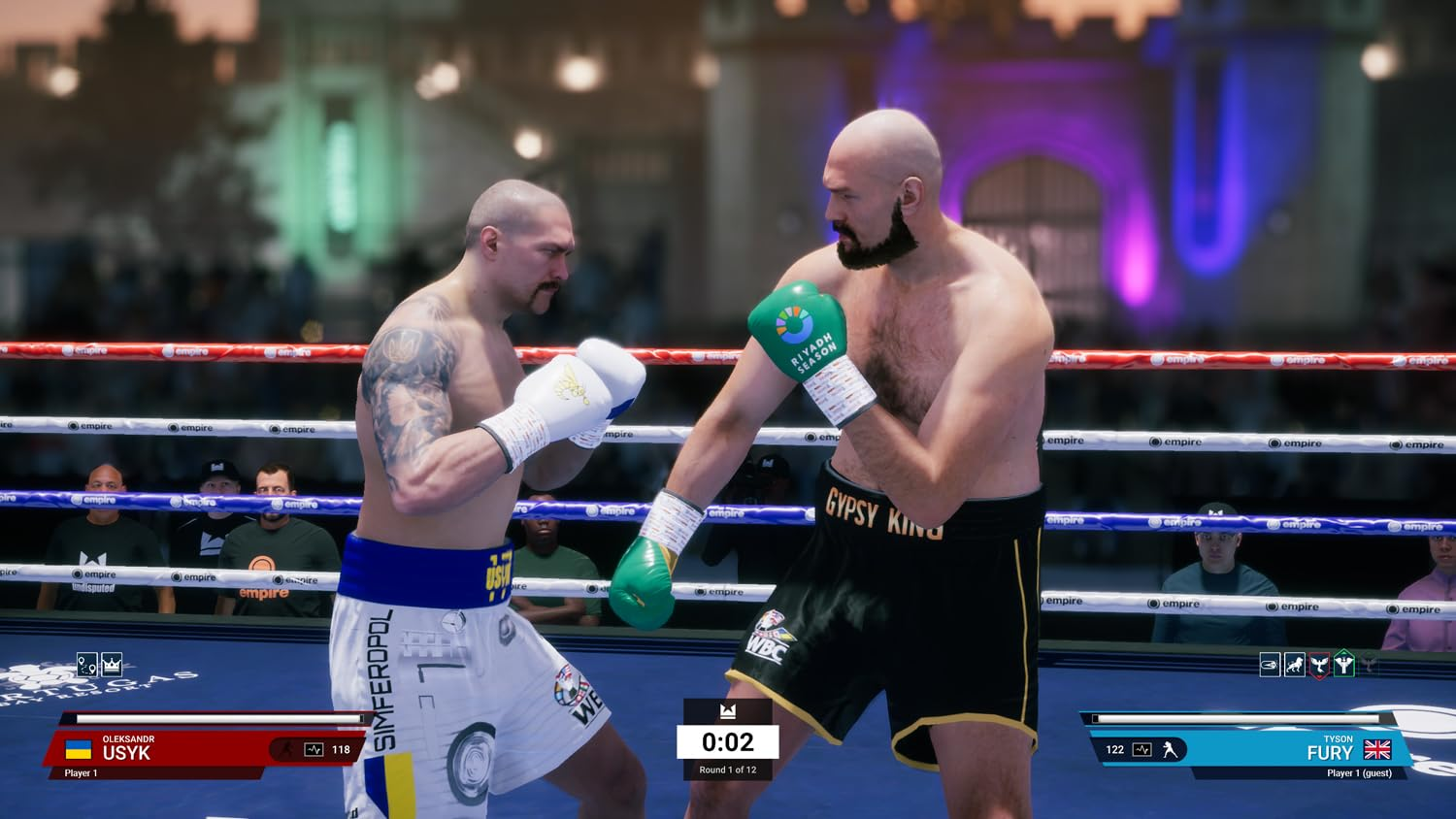 Due pugili sul ring, Usyk contro Fury. Usyk indossa pantaloncini bianchi, Fury pantaloncini neri. L'incontro è nel primo round.