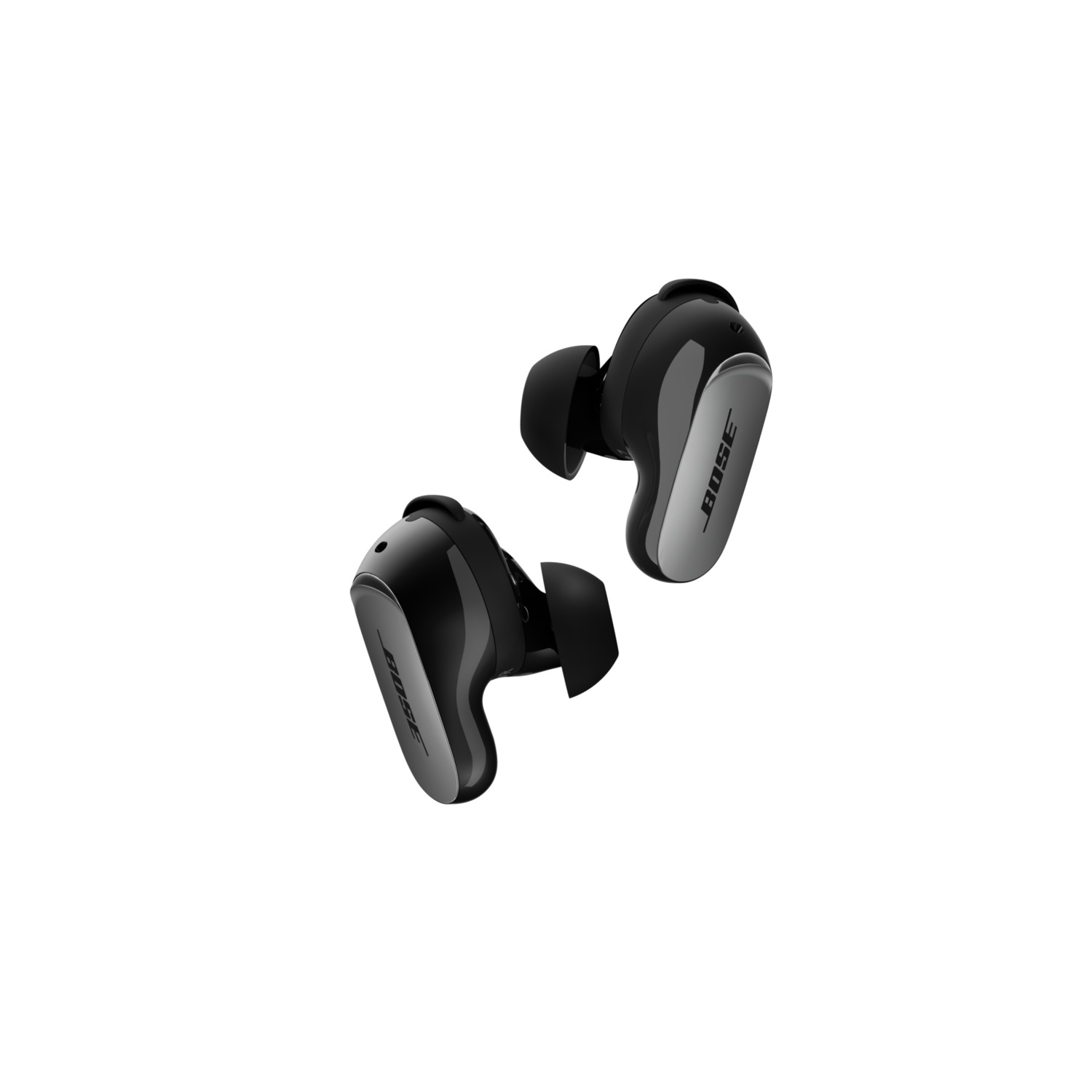 Two black and silver Bose wireless earbuds, angled. Each has a rounded shape with a silver panel and black rubber ear tips.