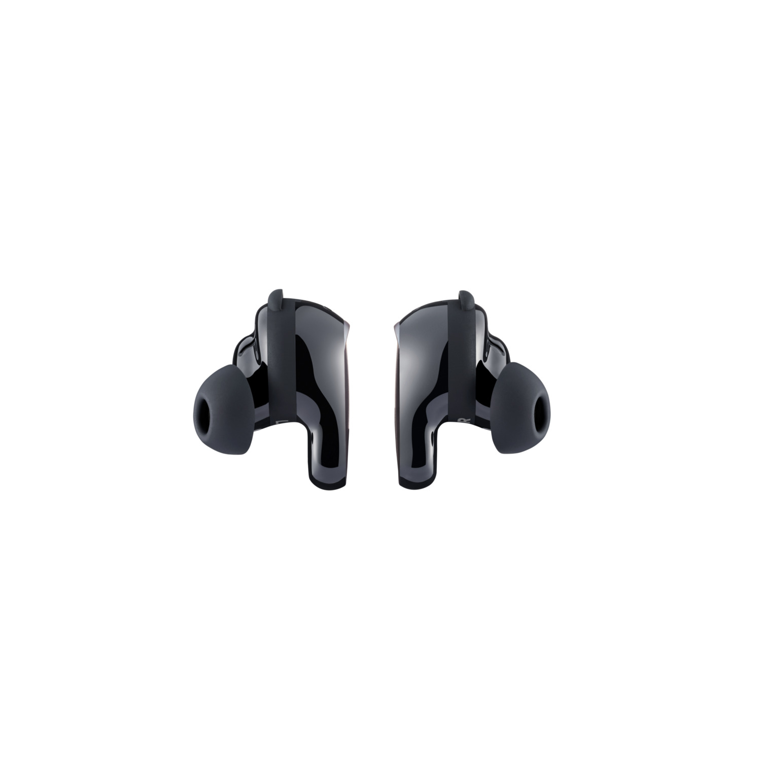 Two black wireless earbuds with gray ear tips are positioned on a white background, isolated and facing each other.