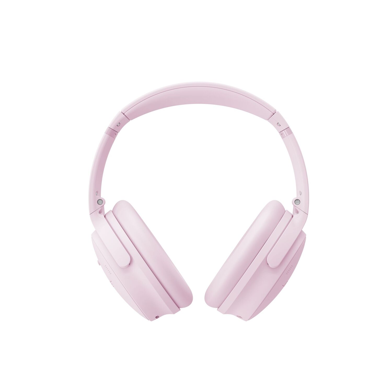 Een paar lichtroze koptelefoons op een witte achtergrond. De koptelefoon is over-ear stijl, met een gevoerde oorschelp.