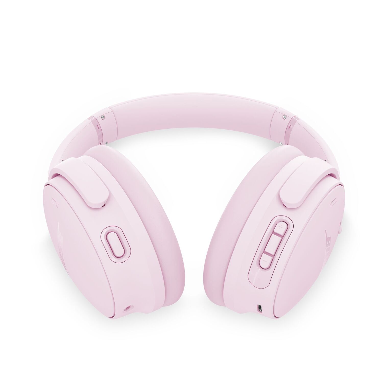 Roze koptelefoon op een witte achtergrond. De koptelefoon staat open, met de oorschelpen en hoofdband.