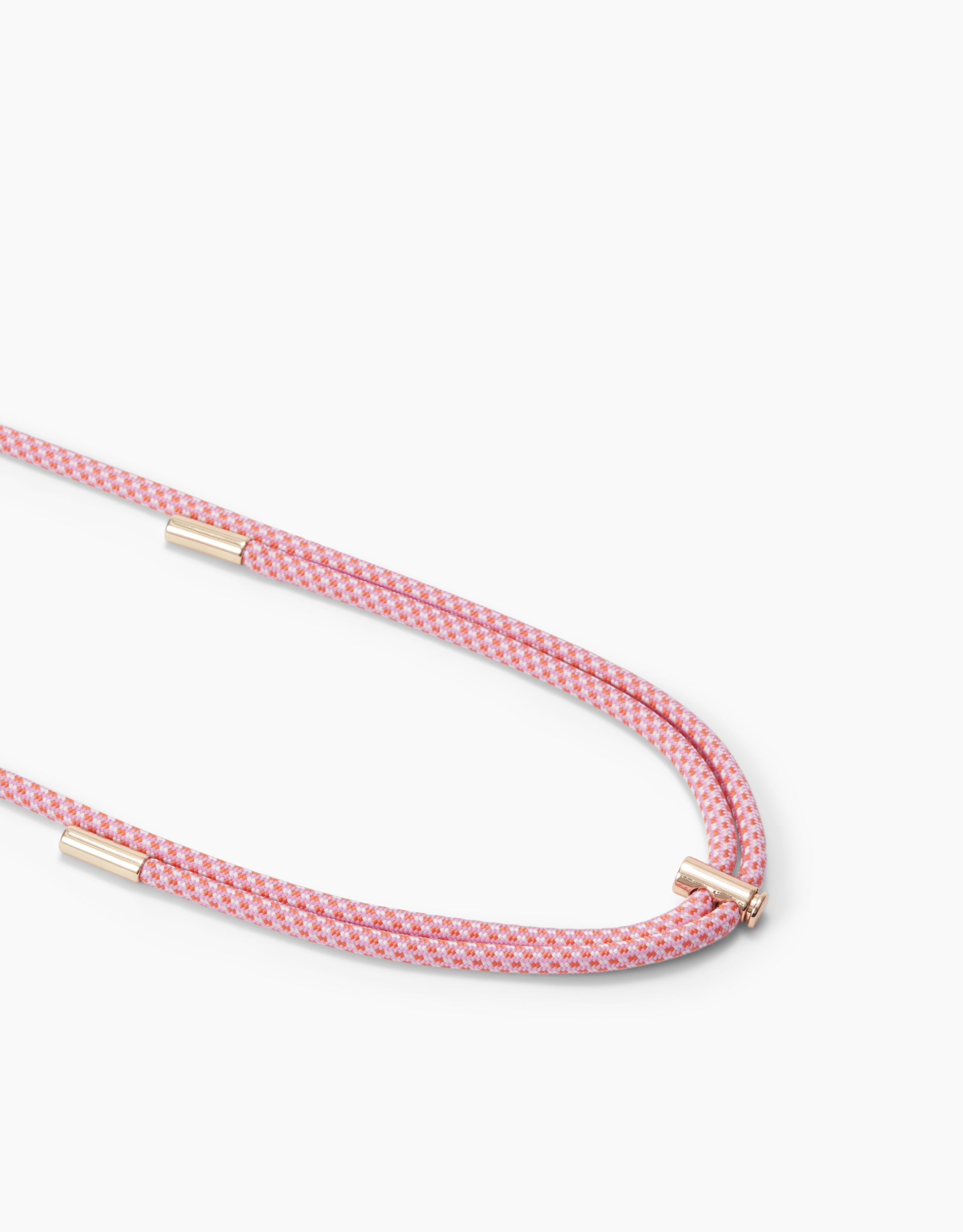 Rosafarbenes und weiß gemustertes Kabel mit goldenen Verschlüssen auf weißem Grund. Das Kabel ist geschlungen.
