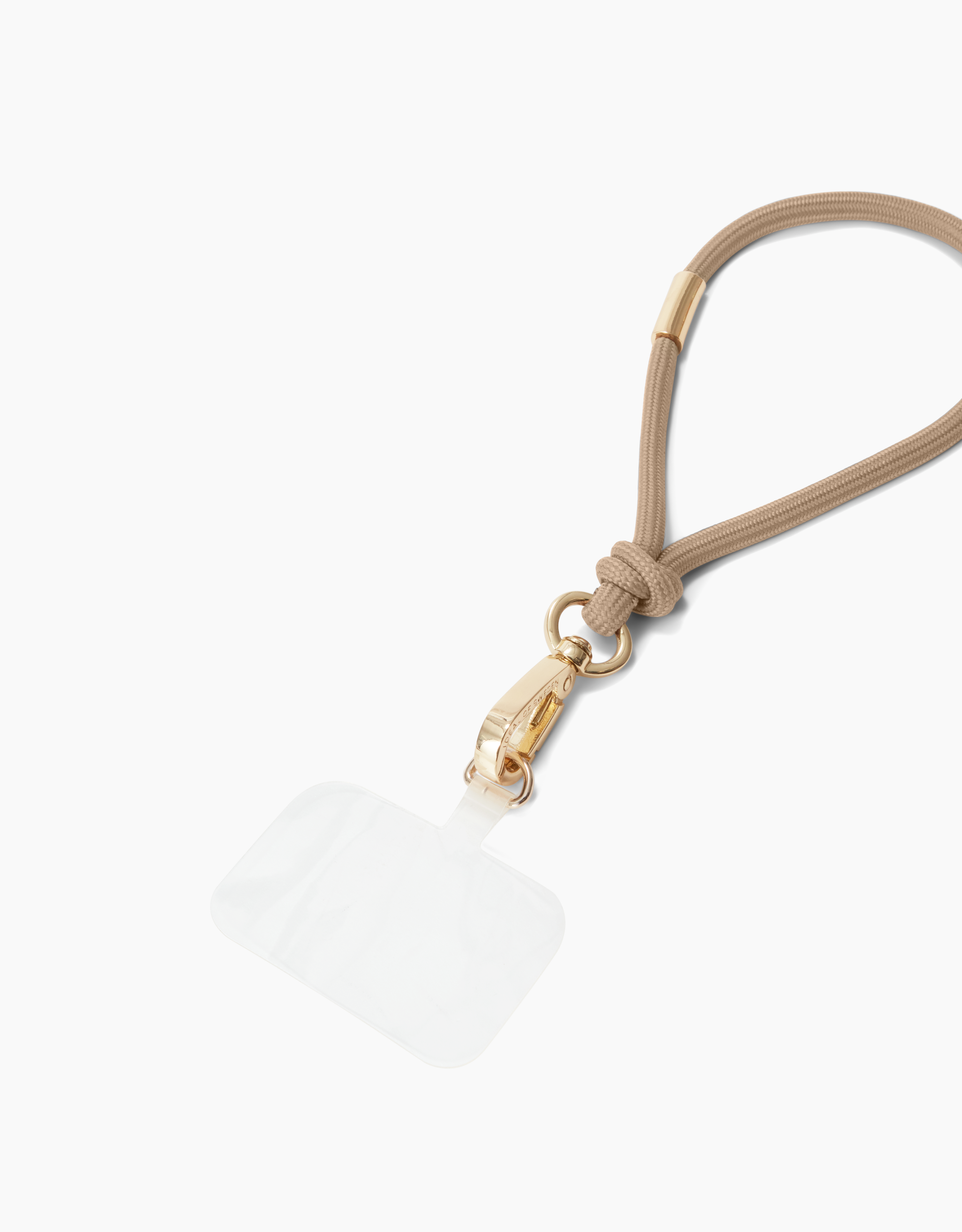 Beige Handyband mit goldenem Verschluss und transparentem Kunststoffhalter, vor weißem Hintergrund.
