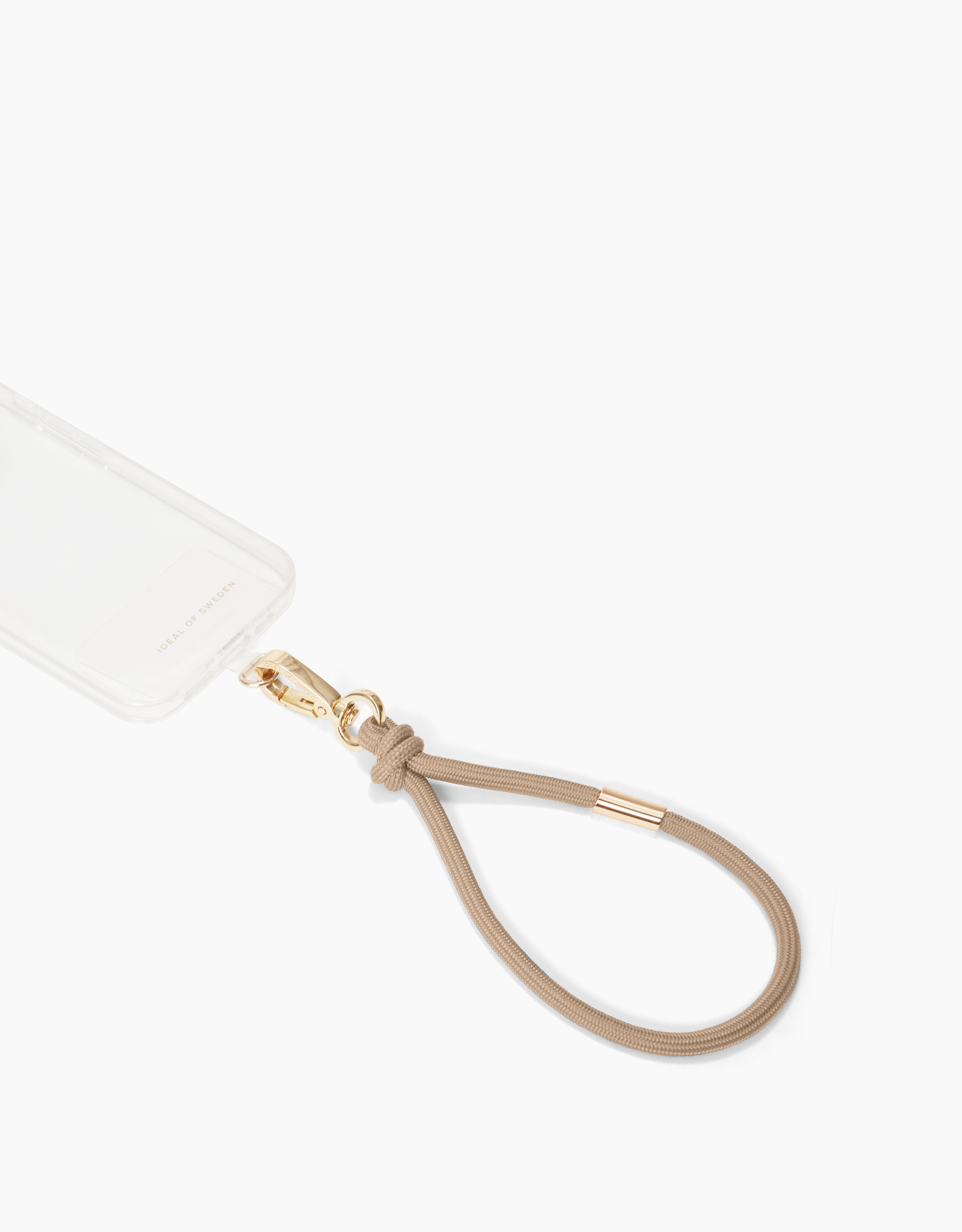 Eine Handyhülle mit beigefarbenem Umhängeband. Die Hülle ist transparent. Das Umhängeband hat einen goldenen Verschluss.