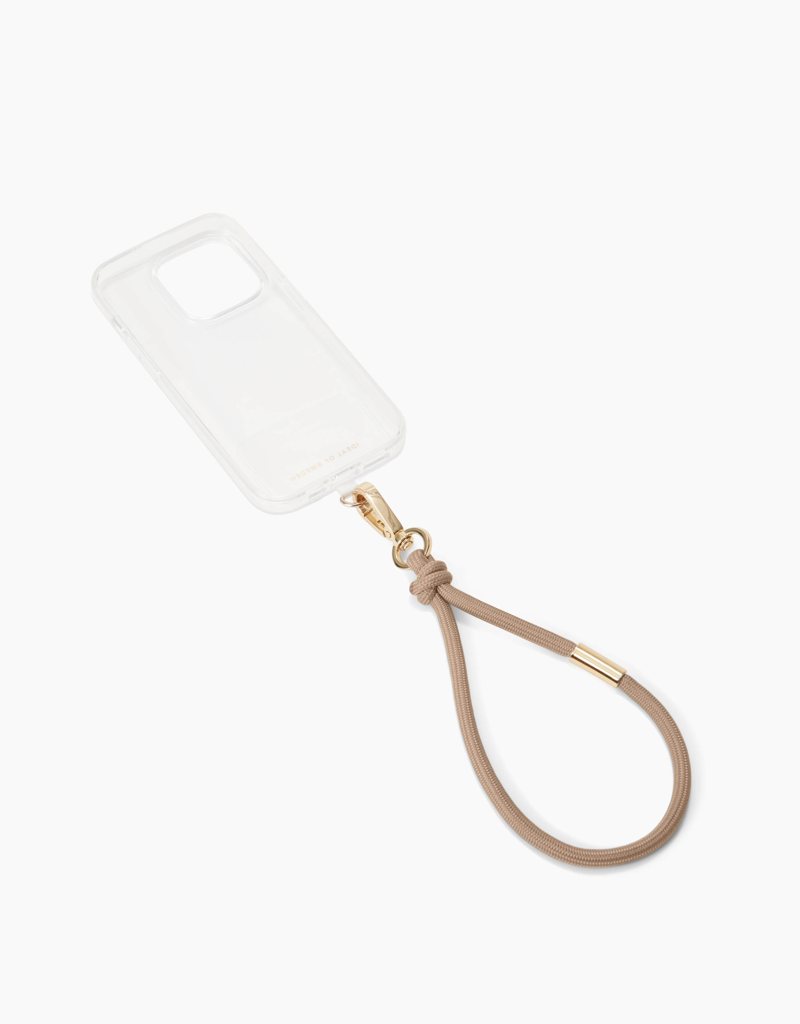 Transparente Handyhülle mit beigefarbenem Umhängeband. Das Band hat goldfarbene Metallakzente auf weißem Hintergrund.