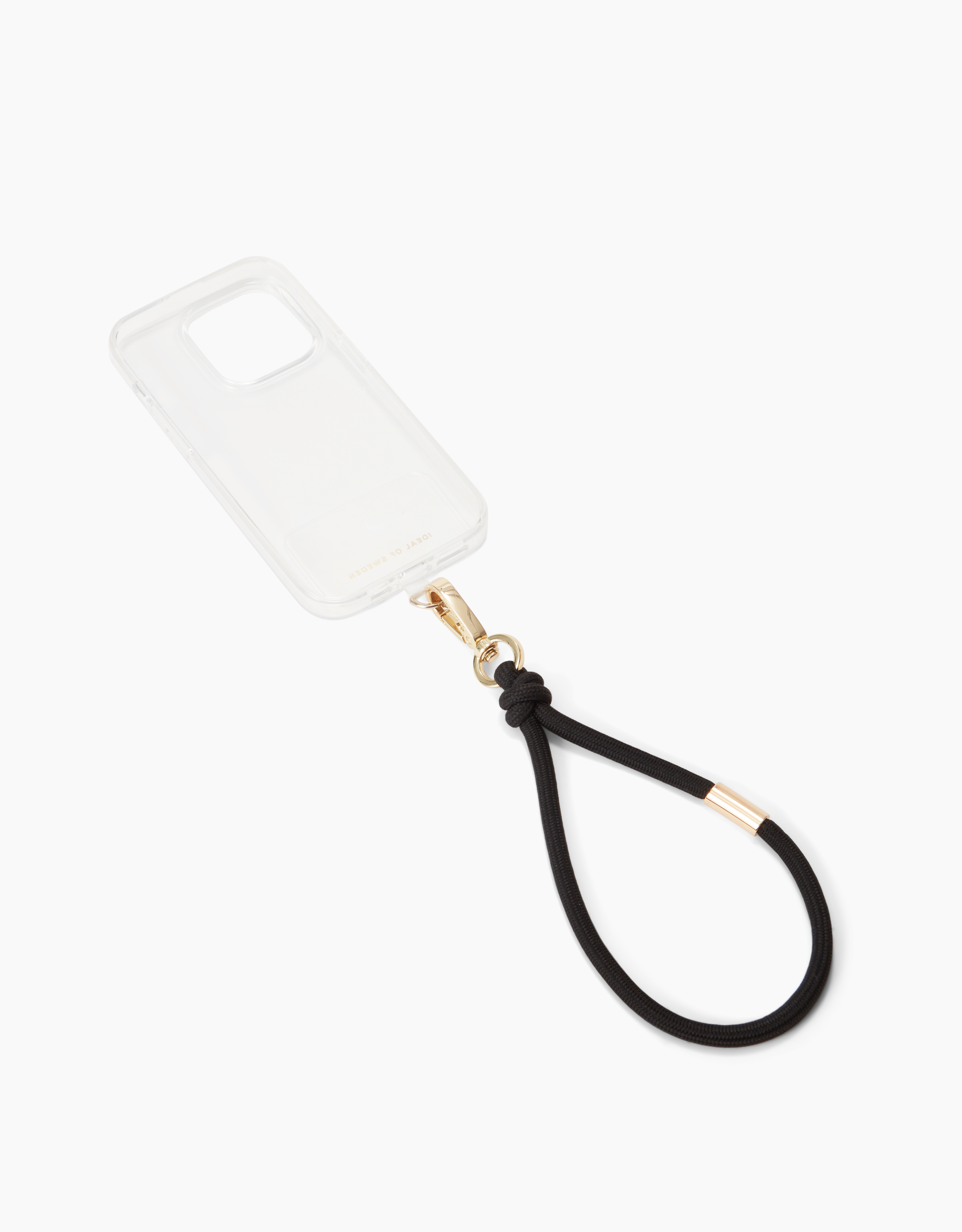 Transparente Handyhülle mit schwarzem Umhängeband und goldfarbener Hardware. Hülle ist abgewinkelt. Umhängeband bildet eine Schlaufe.