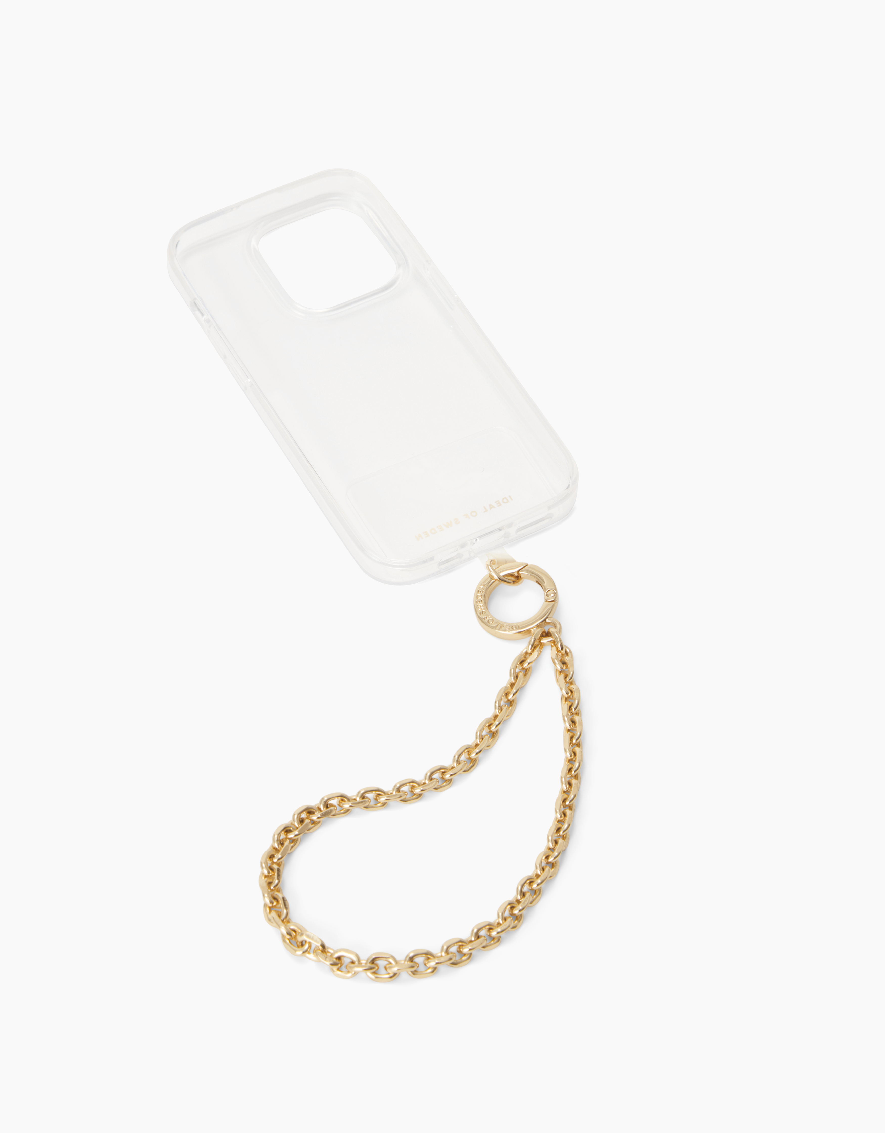 Transparente Handyhülle mit goldener Kette auf weißem Hintergrund. Die Kette ist geschlungen, das Gehäuse leicht angewinkelt.