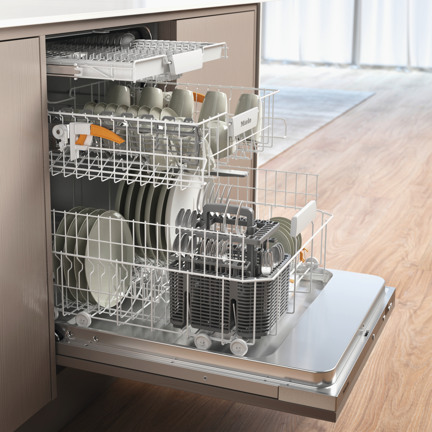 An open dishwasher with dishes. Plates, cups, and utensils are visible in the racks. The dishwasher is in a kitchen setting, with wooden floor.