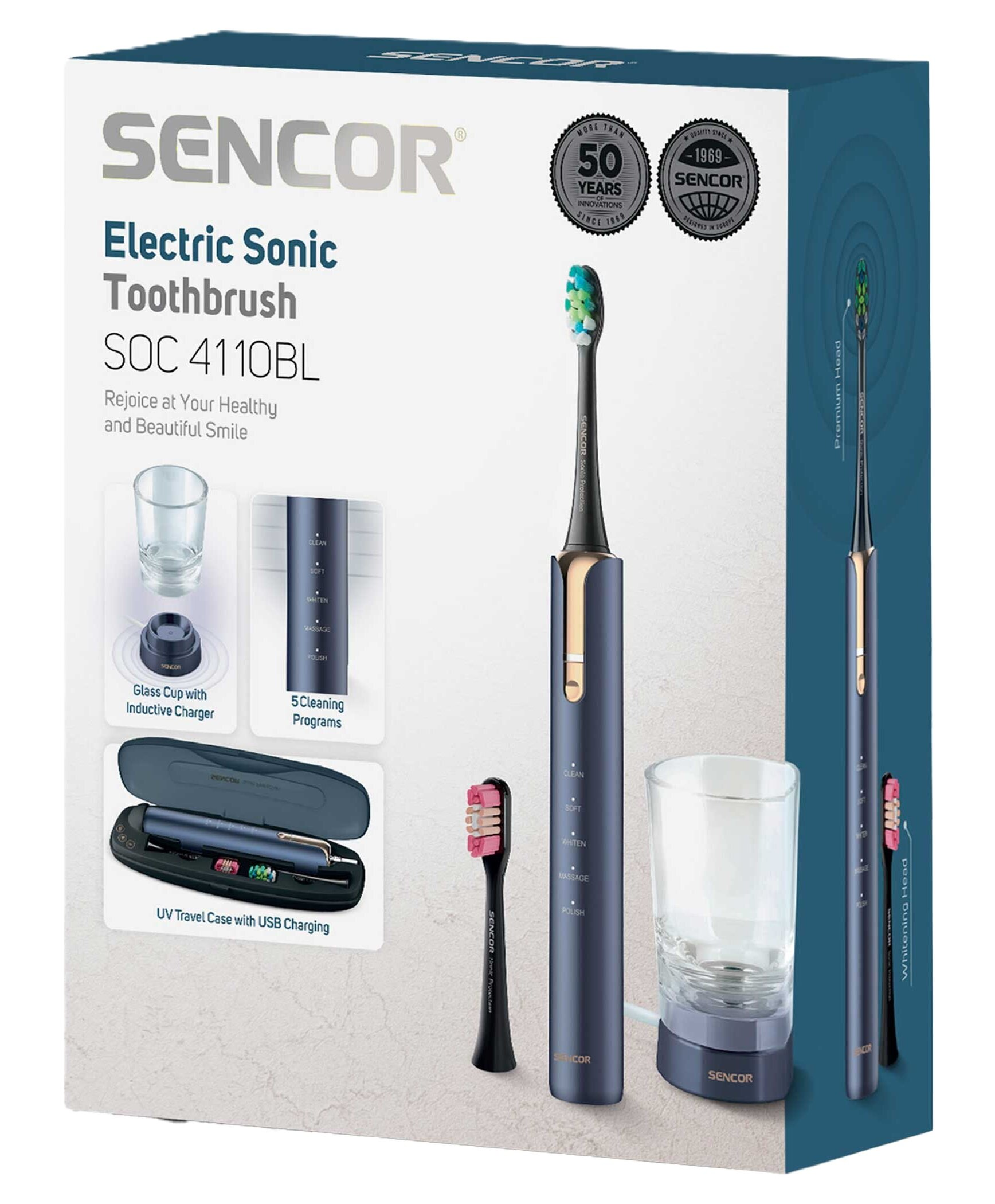 Pudełko z elektryczną szczoteczką do zębów, szklanką i ładowarką. Zawiera dodatkowe głowice i etui podróżne. Marka: Sencor.