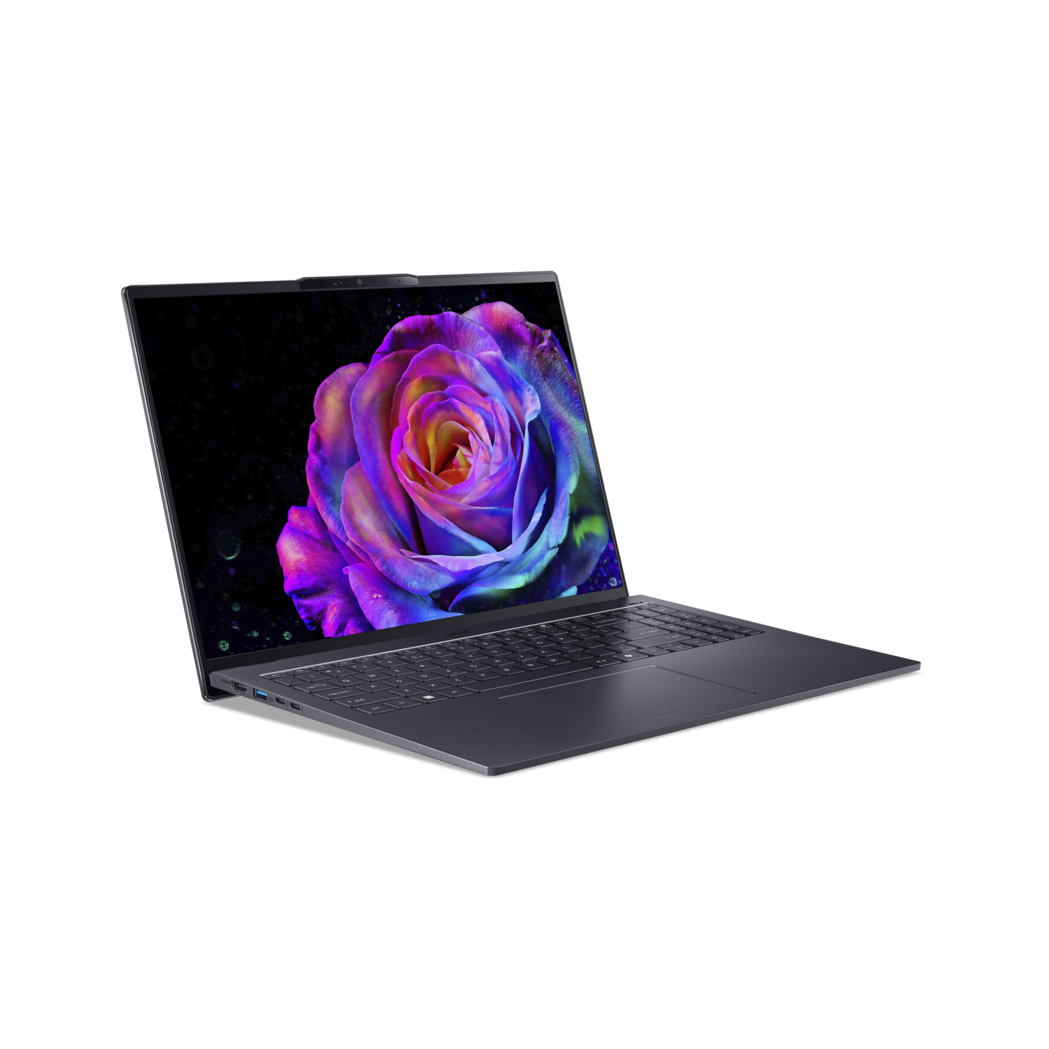 Een laptop toont een kleurrijke roos tegen een zwarte achtergrond. De laptop is open en toont het toetsenbord en scherm.