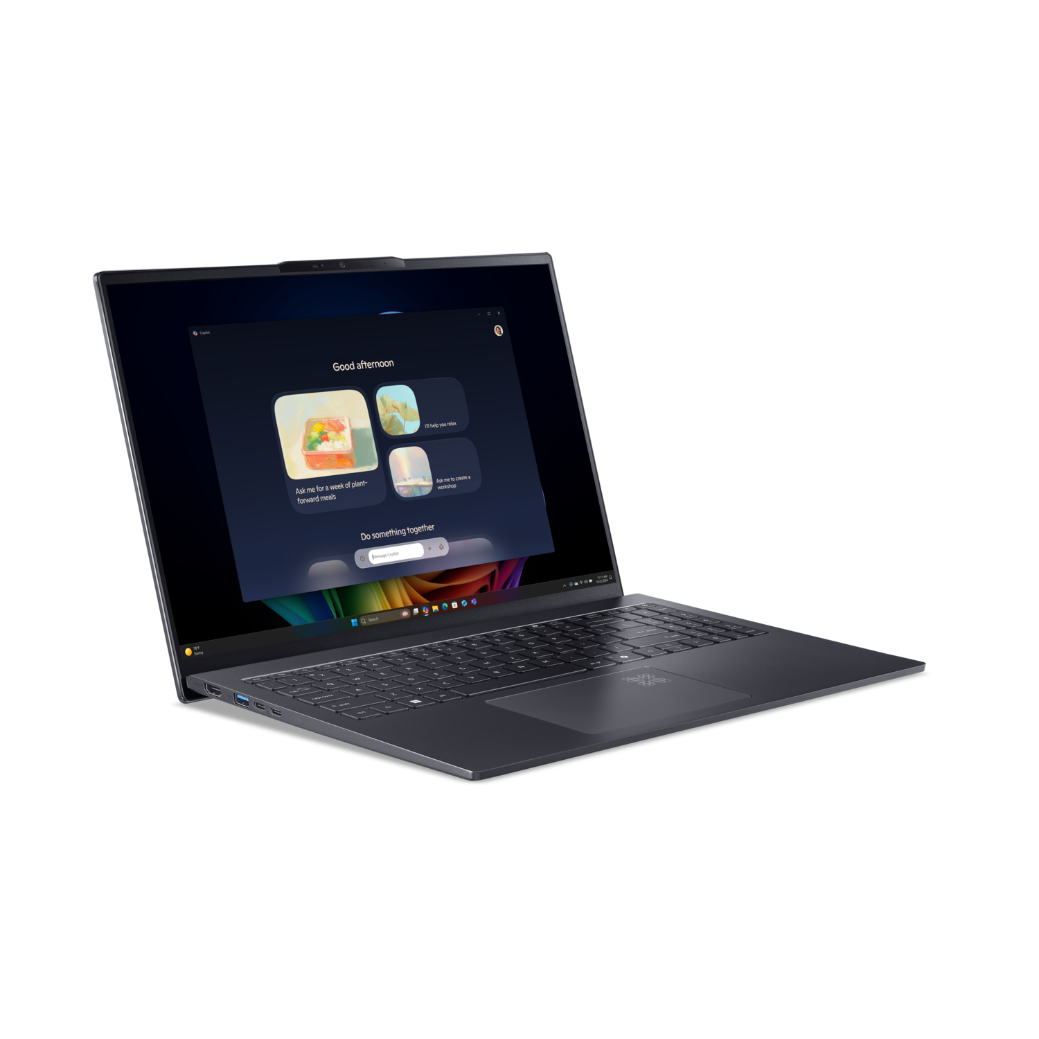 Laptop op zwarte achtergrond, scherm toont app met opties zoals 'Vraag me om een week plantaardige maaltijden'.