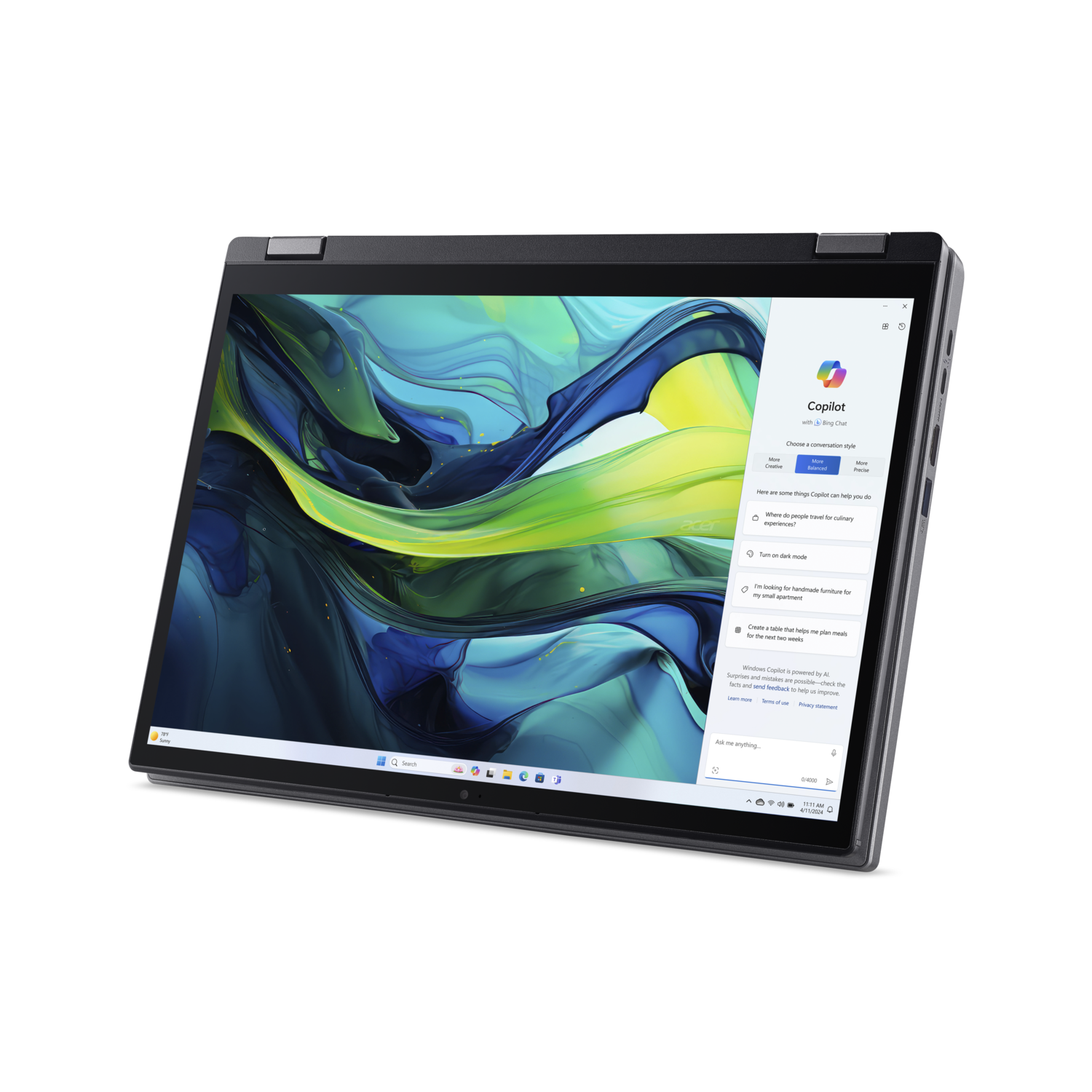 Een laptop toont Copilot, een Bing Chat-assistent. Het scherm toont een kleurrijk abstract behang. De laptop staat op een zwarte achtergrond.