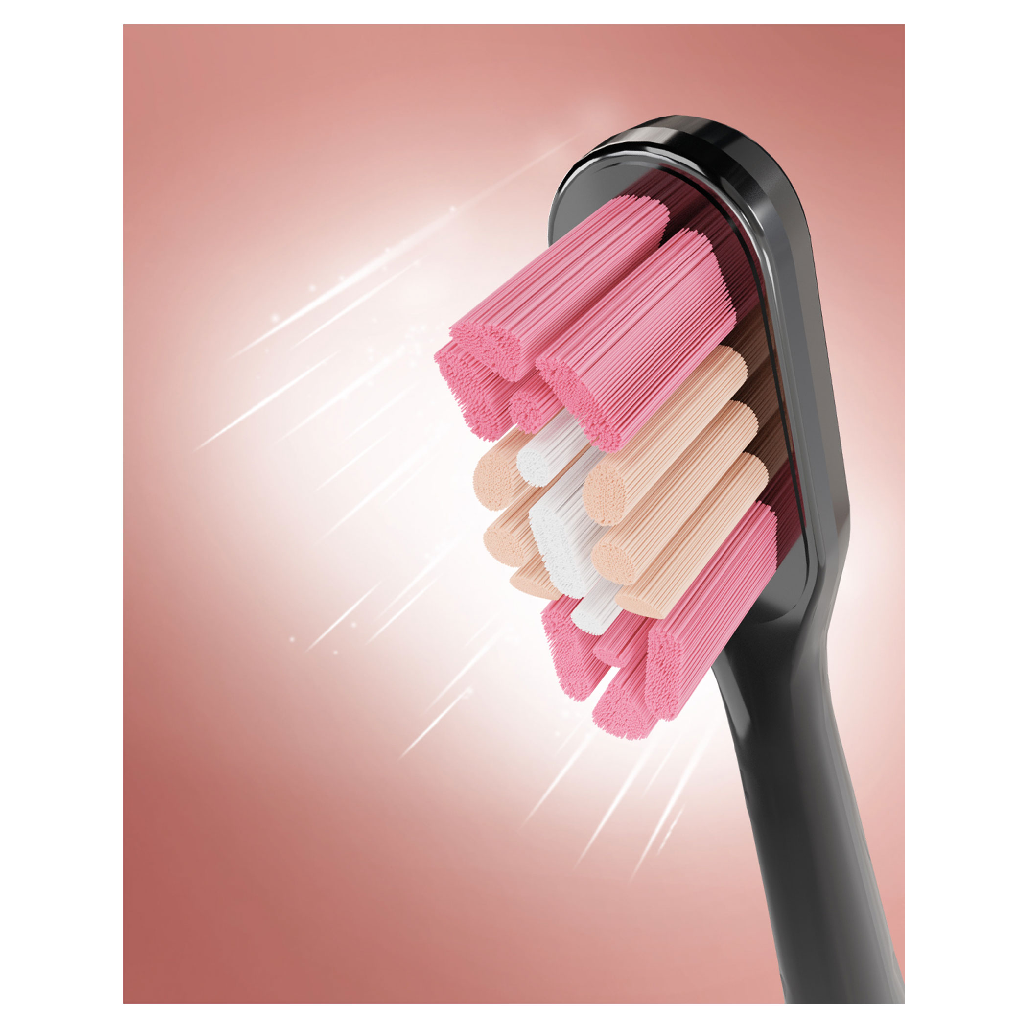 Zbliżenie główki szczoteczki do zębów z różowymi, białymi i beżowymi włosiem na gradientowym czerwonym tle. Rękojeść jest czarna.