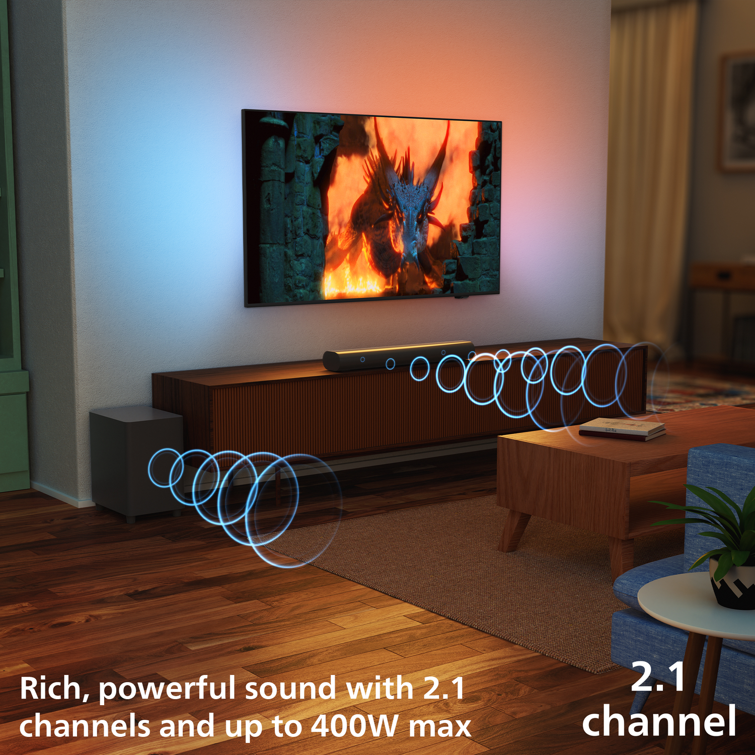 Woonkamer met tv met draken. Soundbar, subwoofer en visuele geluidsgolven. Tekst: 2.1 kanaal, 400W max.